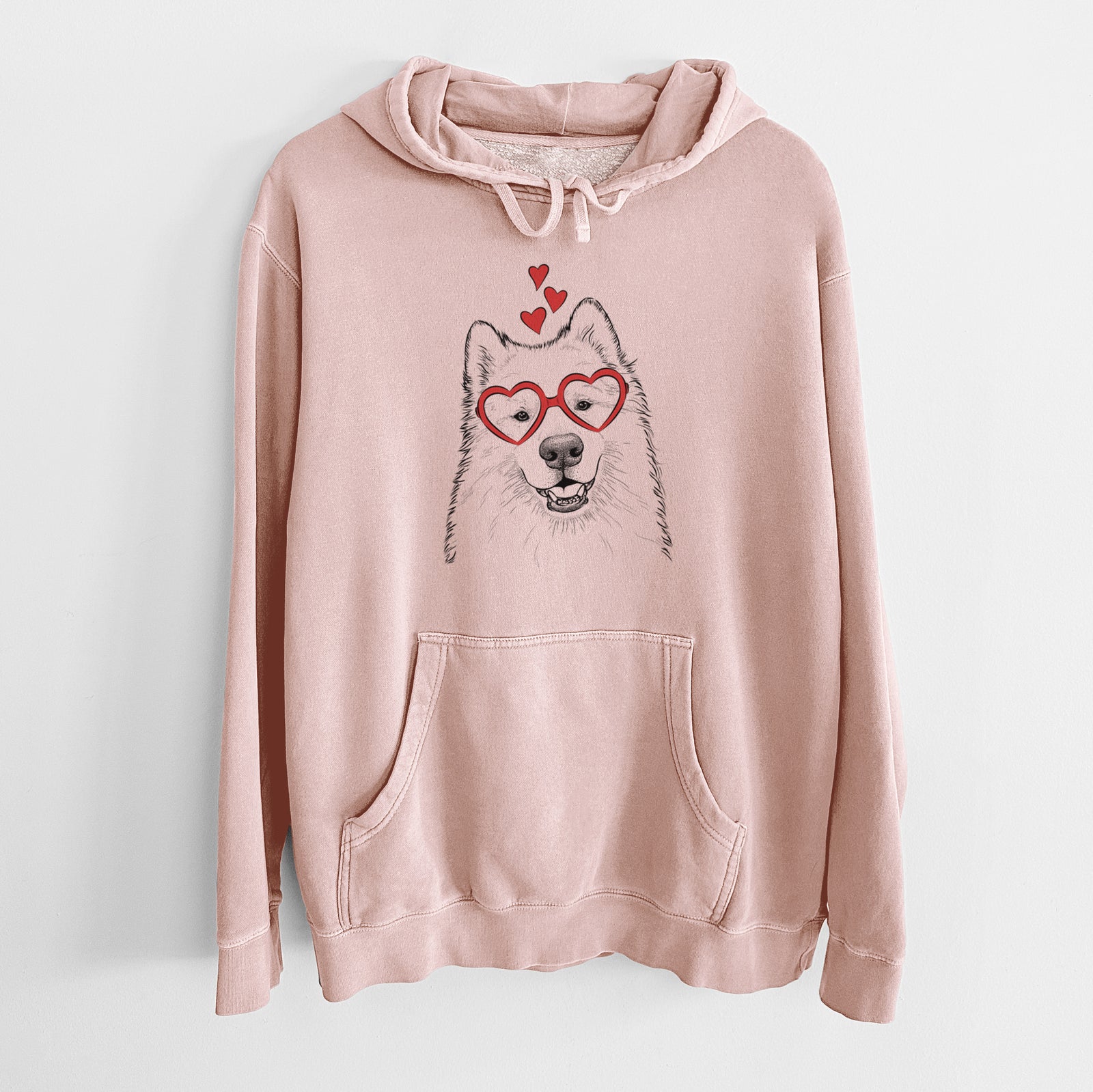 Hand-drawn sketch of Foster the Samoyed wearing heart-shaped glasses on a Dusty Pink Unisex pigment dyed hoodie