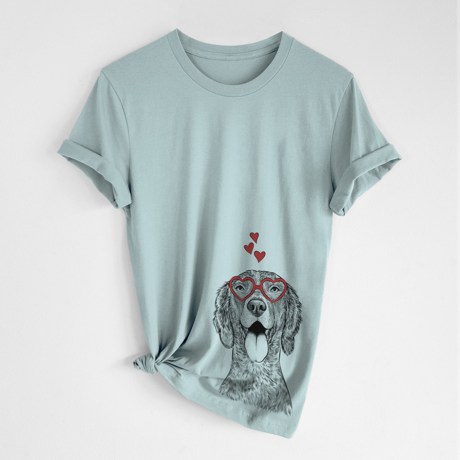 Hand-drawn sketch of Freddy the English Setter wearing heart-shaped glasses on a Dusty Blue Unisex crewneck, worn by a woman