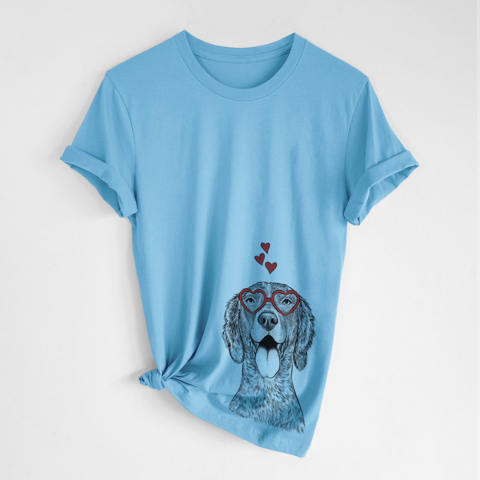 Hand-drawn sketch of Freddy the English Setter wearing heart-shaped glasses on an Ocean Blue Unisex crewneck, worn by a woman