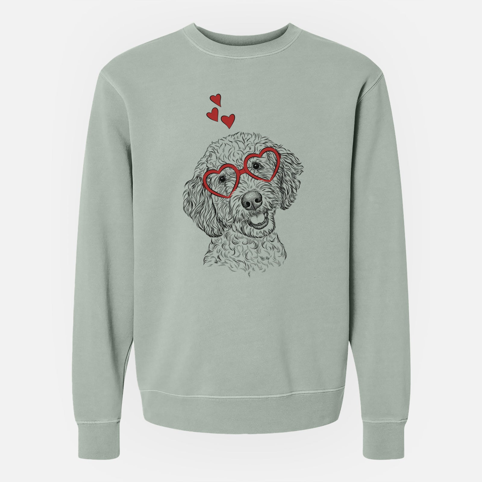 Hand-drawn sketch of Gizmo the Goldendoodle wearing heart-shaped glasses on a Sage Unisex pigment dyed crew sweatshirt