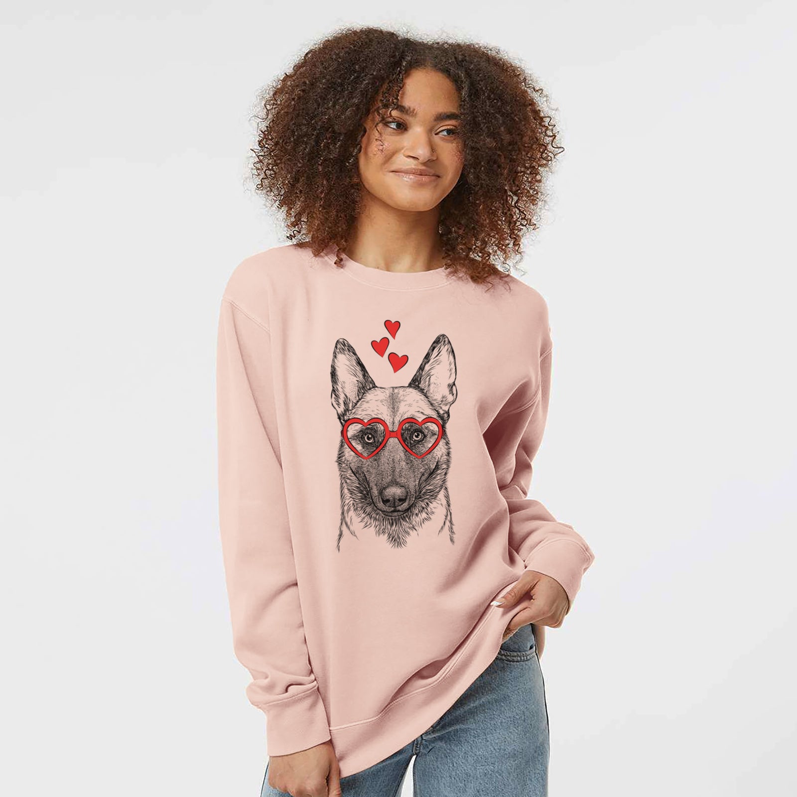 Hand-drawn sketch of Gunther the Belgian Malinois wearing heart-shaped glasses on a Dusty Pink Unisex pigment dyed crew sweatshirt