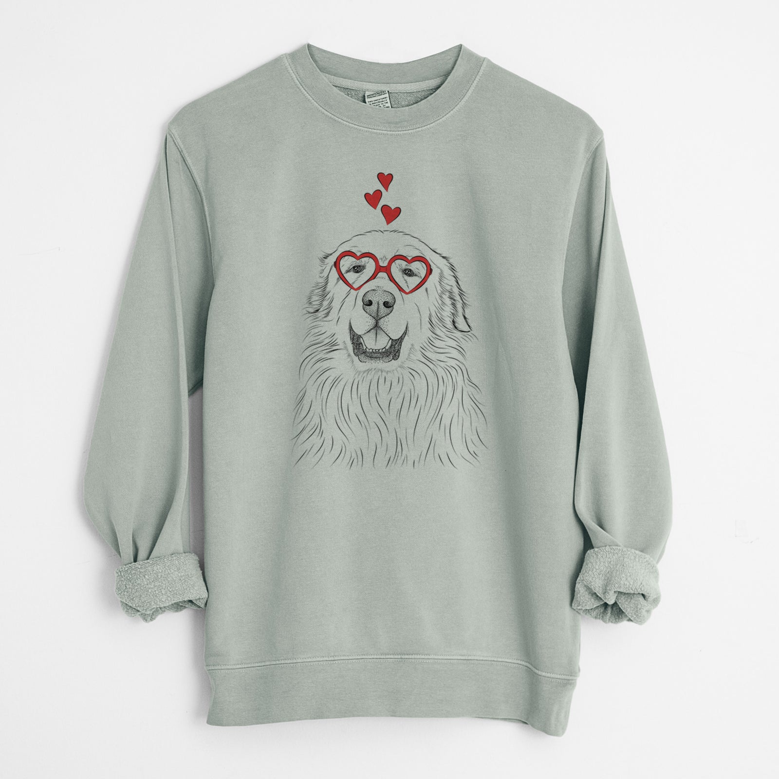 Hand-drawn sketch of Horton the Great Pyrenees wearing heart-shaped glasses on a Sage Unisex pigment dyed crew sweatshirt