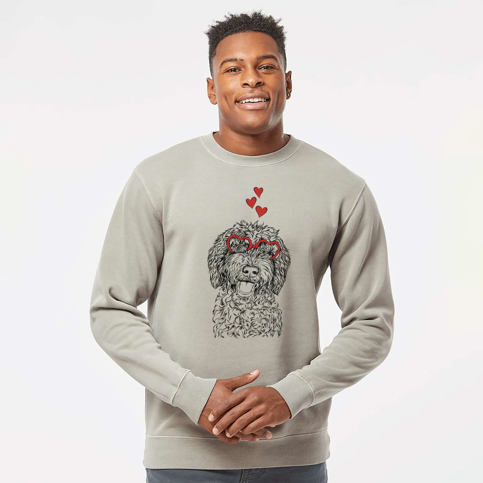 Hand-drawn sketch of Jack the Chocolate Labradoodle wearing heart-shaped glasses on a Cement Unisex pigment dyed crew sweatshirt
