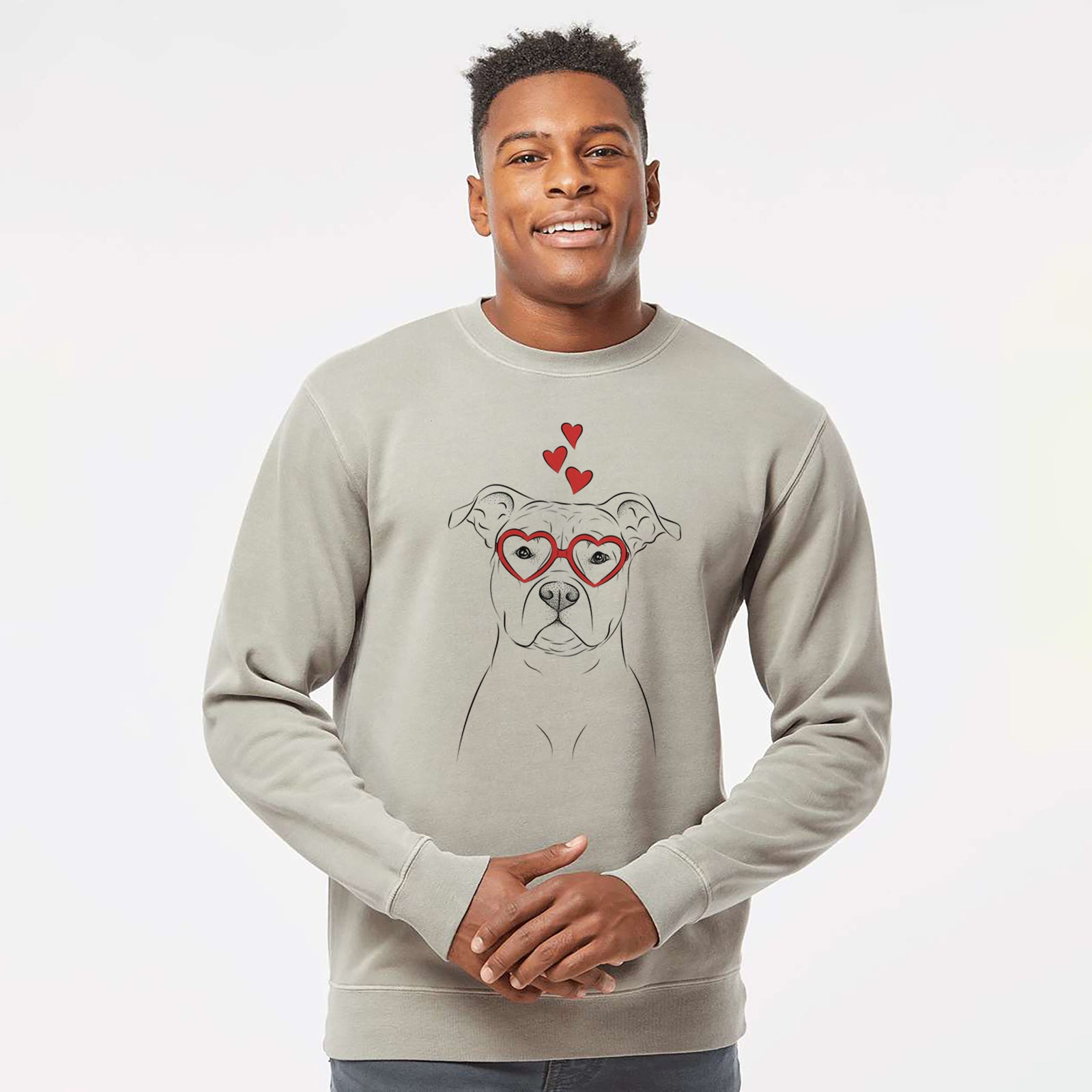 Hand-drawn sketch of Jethro the American Staffordshire Terrier wearing heart-shaped glasses on a Cement Unisex pigment dyed crew sweatshirt