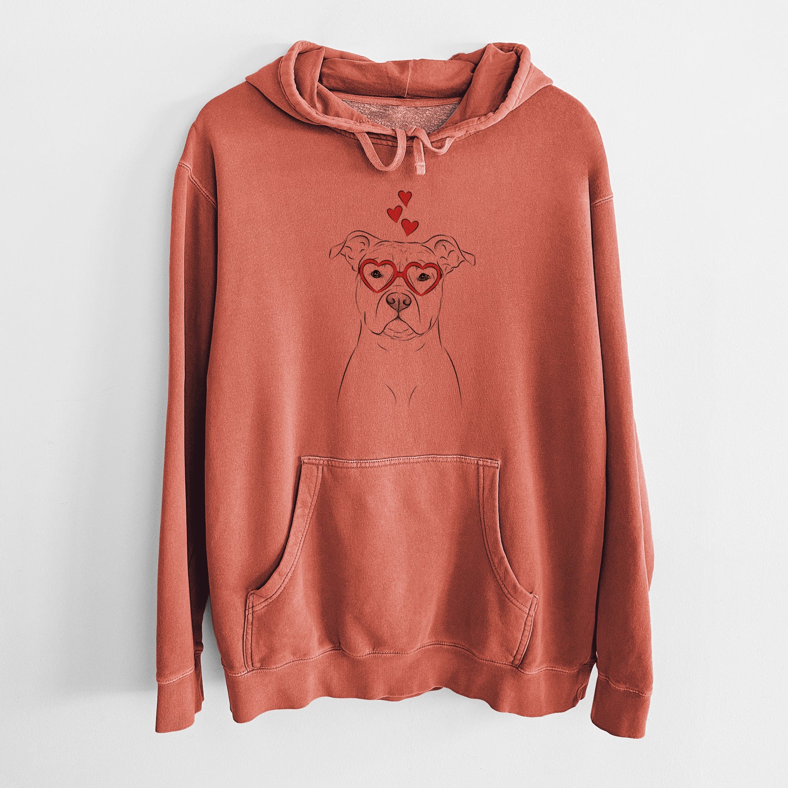 Hand-drawn sketch of Jethro the American Staffordshire Terrier wearing heart-shaped glasses on an Amber Unisex pigment dyed hoodie
