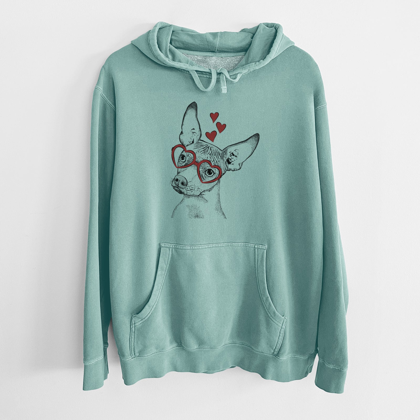 Hand-drawn sketch of Kahlo the Xoloitzcuintli wearing heart-shaped glasses on a Mint Unisex pigment dyed hoodie