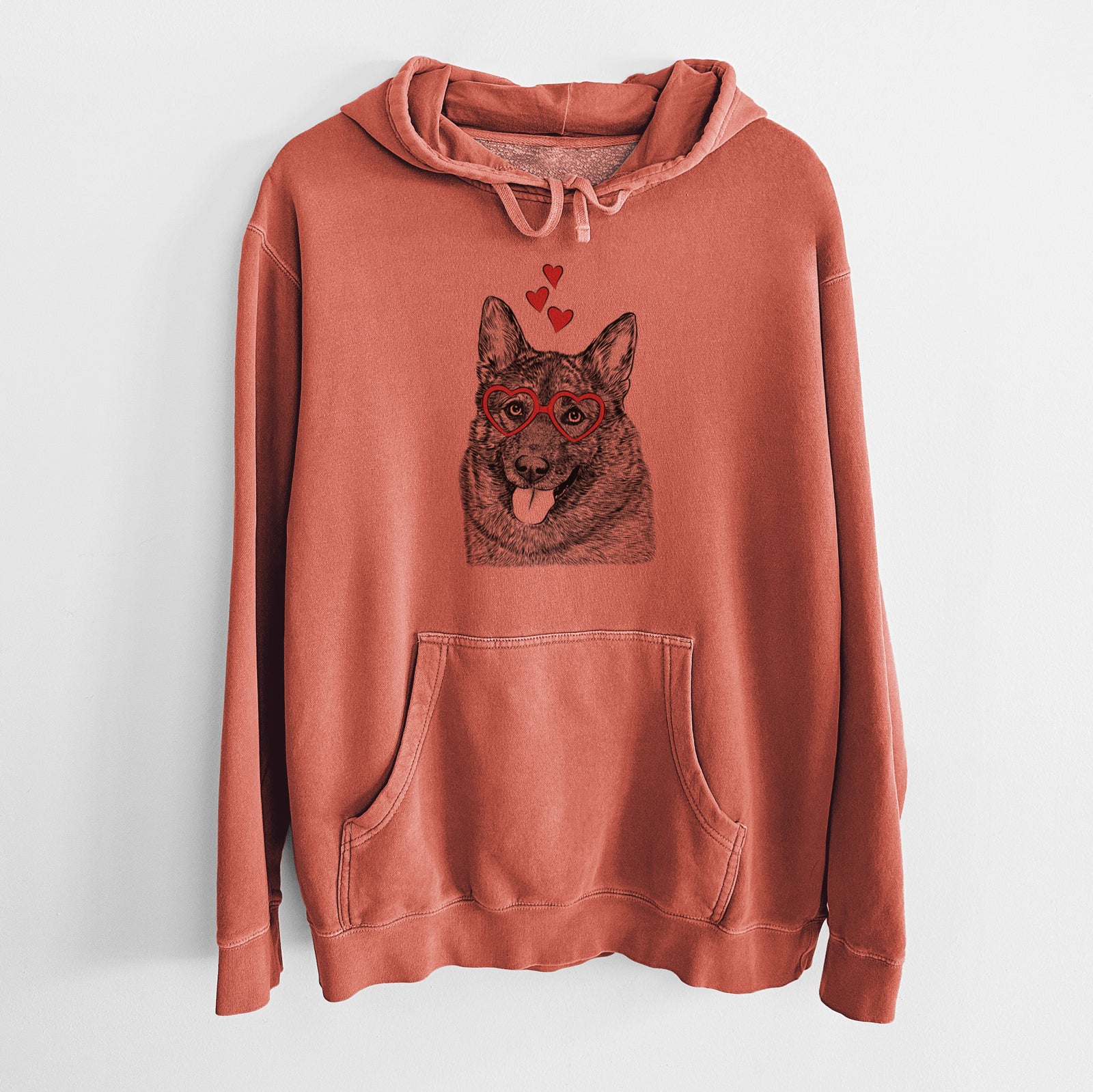 Hand-drawn sketch of Kasia the Norwegian Elkhound wearing heart-shaped glasses on an Amber Unisex pigment dyed hoodie