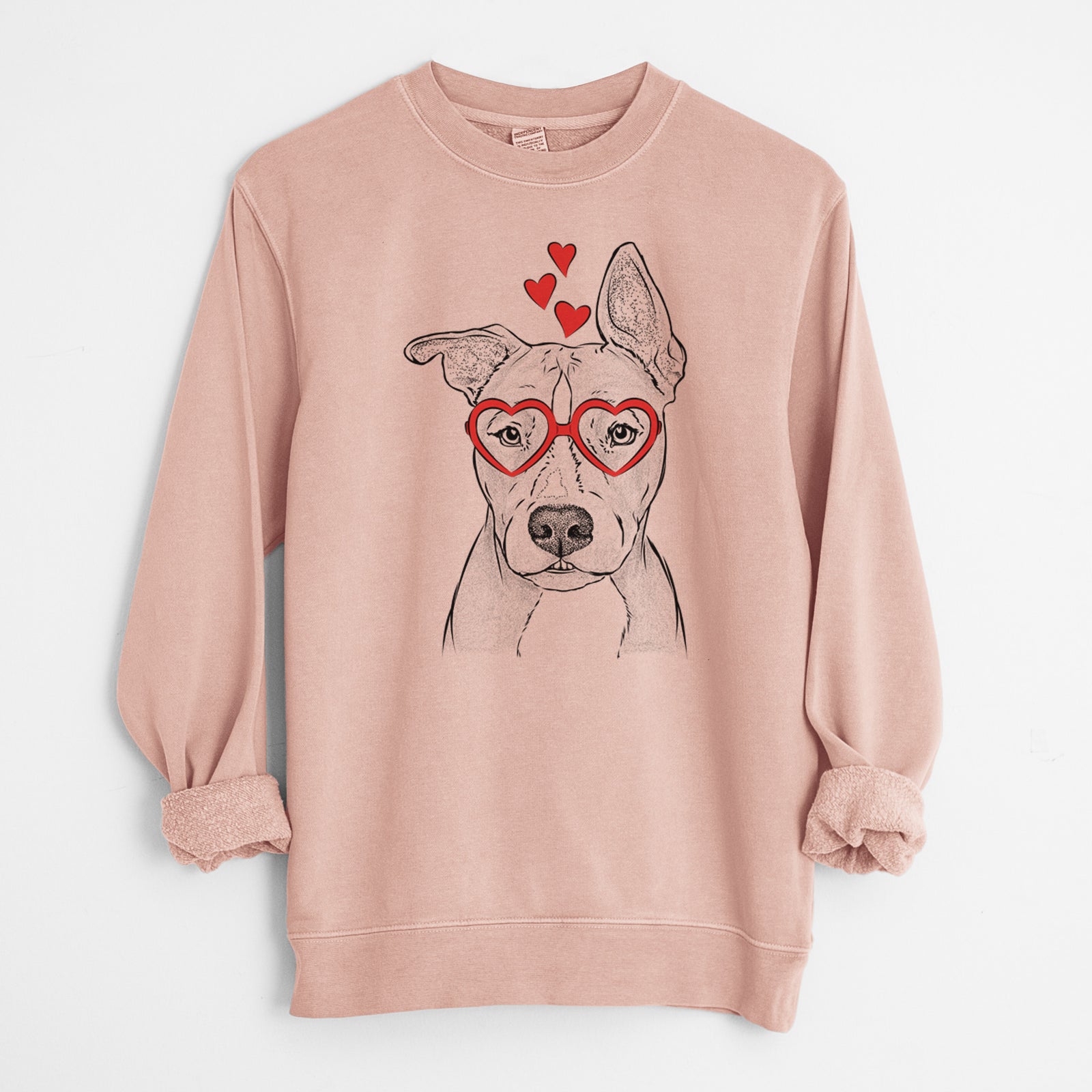 Hand-drawn sketch of Kisses the Pitbull wearing heart-shaped glasses on a Dusty Pink Unisex pigment dyed crew sweatshirt