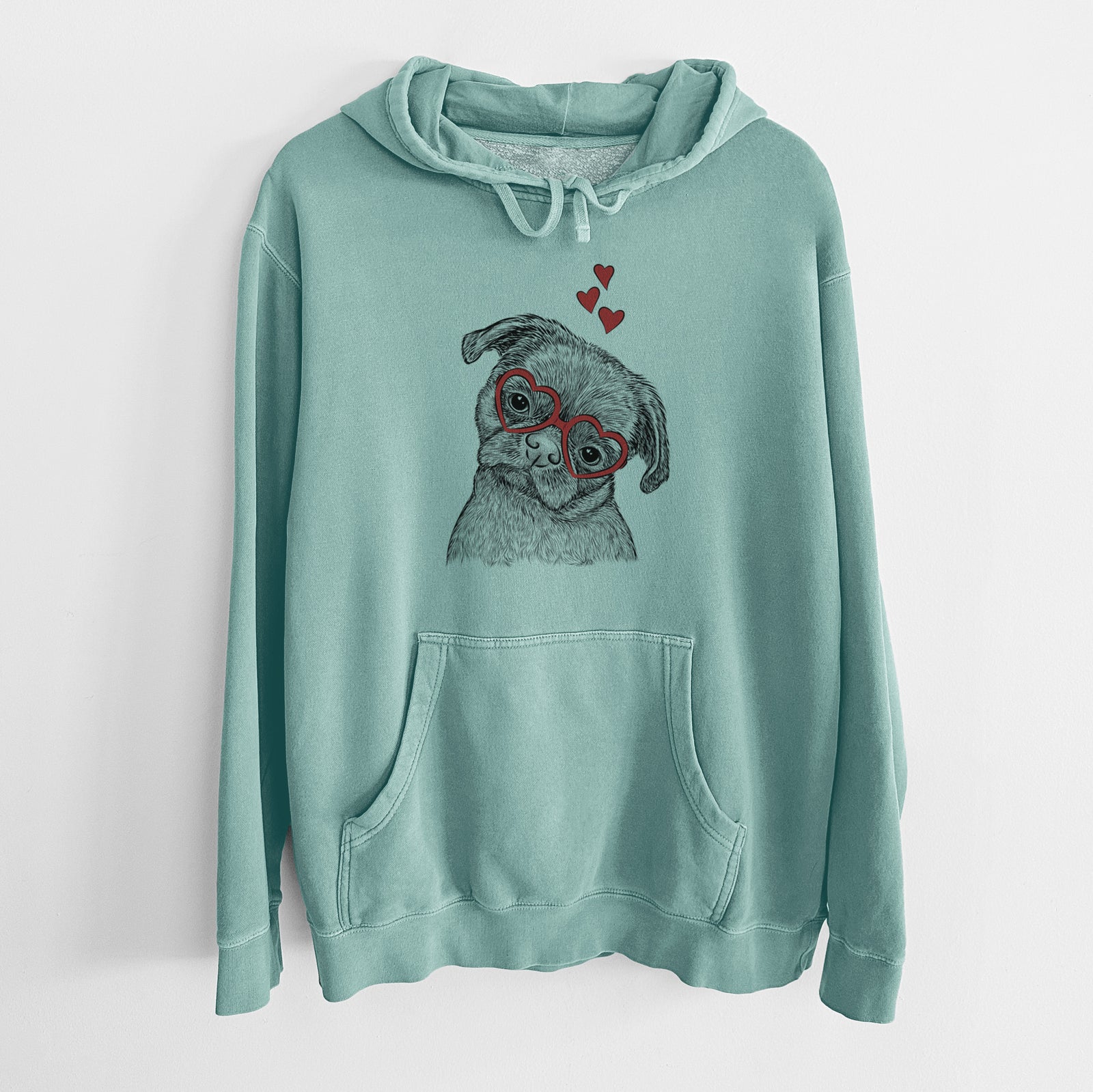 Hand-drawn sketch of Koko the Shih Tzu wearing heart-shaped glasses on a Mint Unisex pigment dyed hoodie
