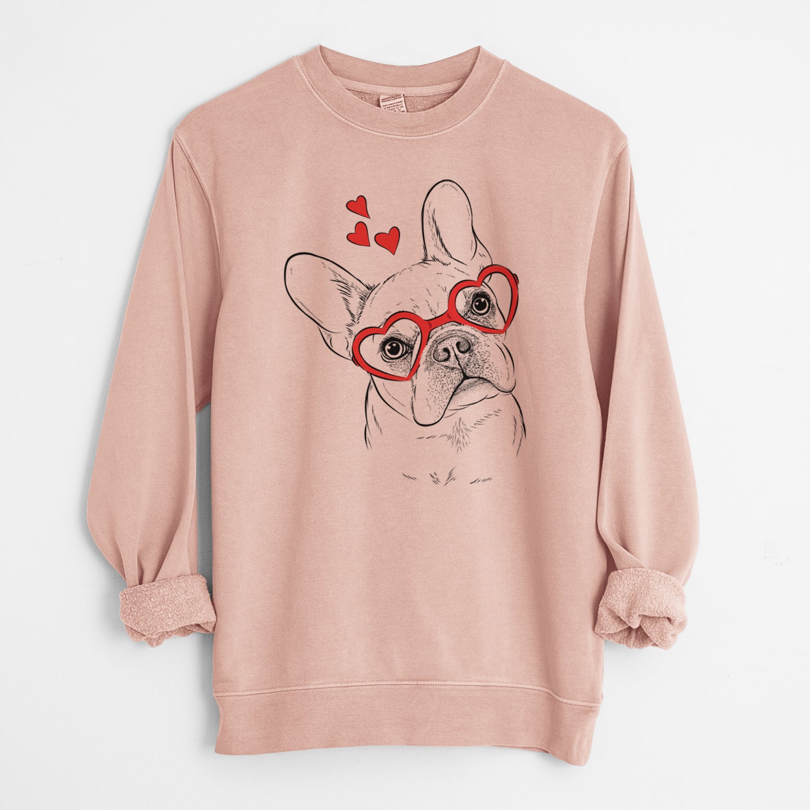 Hand-drawn sketch of Loki the French Bulldog wearing heart-shaped glasses on a Dusty Pink Unisex pigment dyed crew sweatshirt