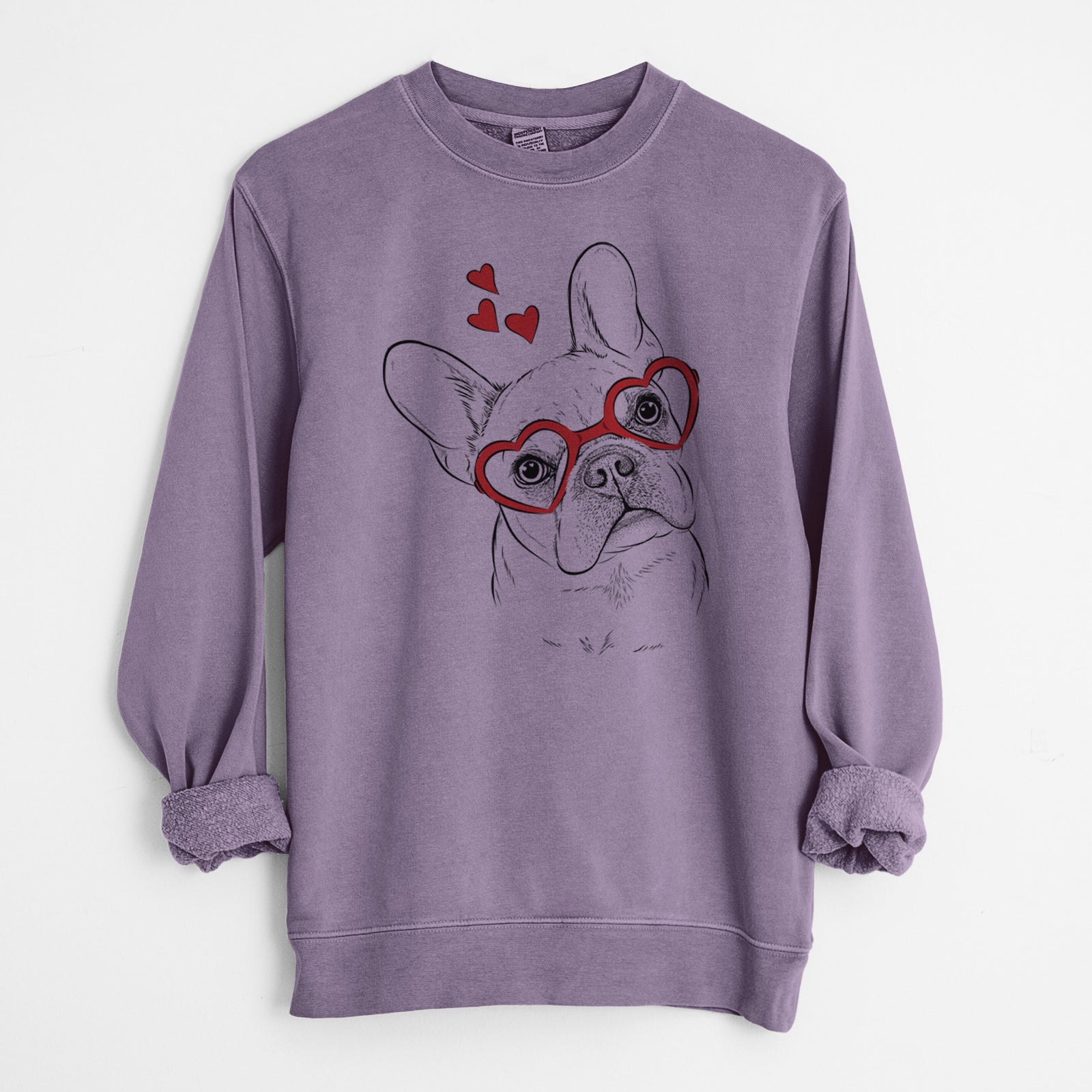 Hand-drawn sketch of Loki the French Bulldog wearing heart-shaped glasses on a Plum Unisex pigment dyed crew sweatshirt