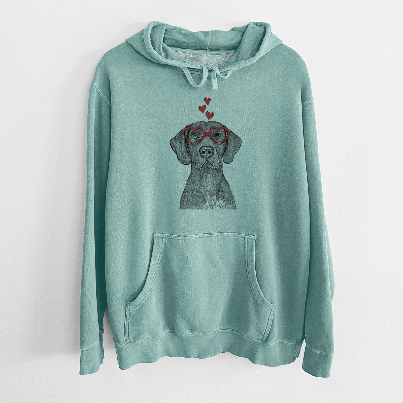 Hand-drawn sketch of Lucifer the German Shorthaired Pointer wearing heart-shaped glasses on a Mint Unisex pigment dyed hoodie