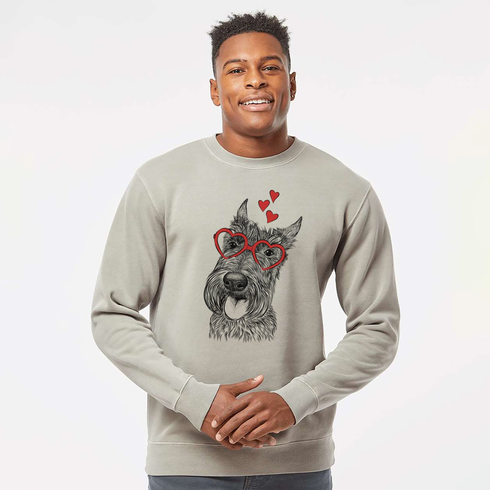 Hand-drawn sketch of Magnus the Scottish Terrier wearing heart-shaped glasses on a Cement Unisex pigment dyed crew sweatshirt