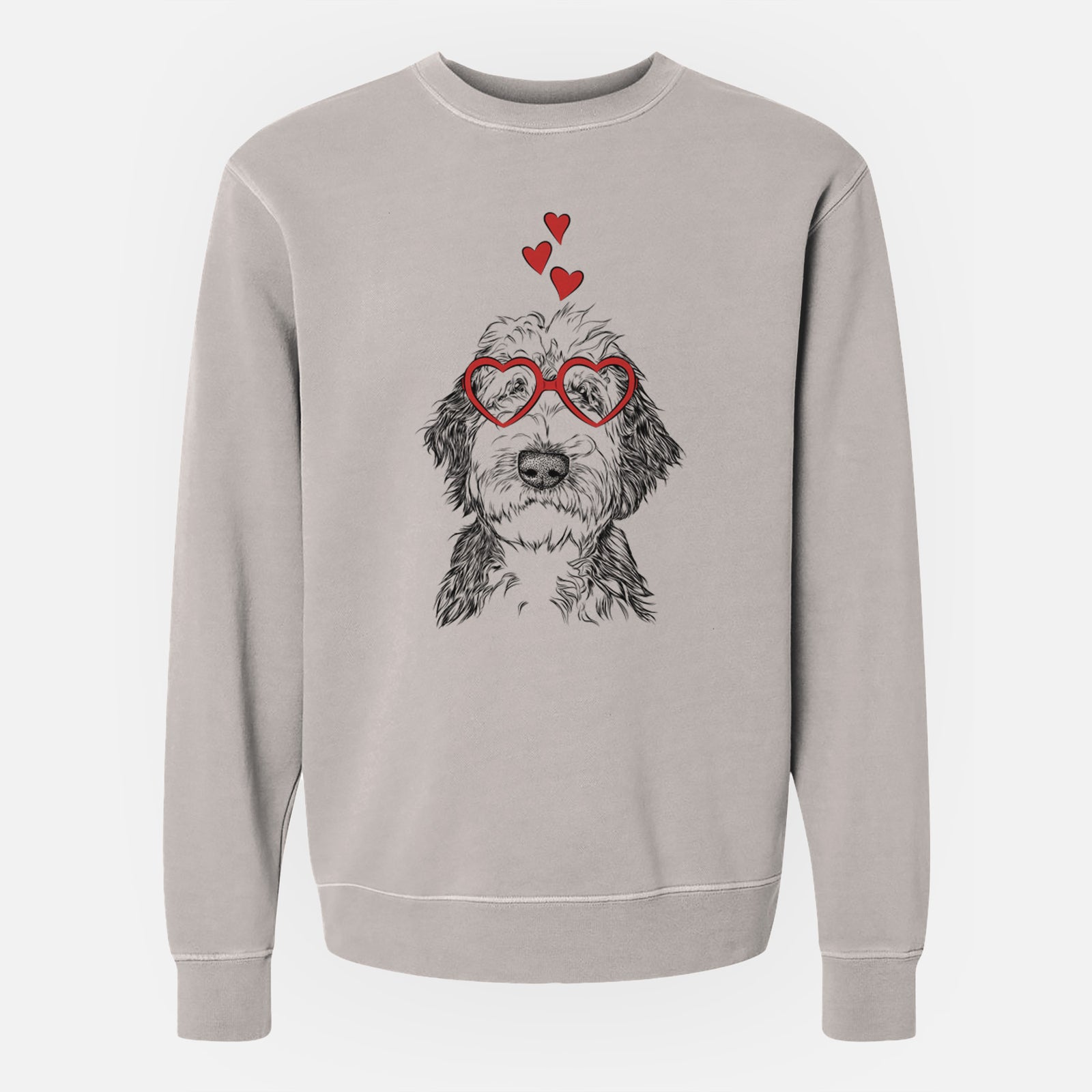 Hand-drawn sketch of Milo Fluff the Sheepadoodle wearing heart-shaped glasses on a Cement Unisex pigment dyed crew sweatshirt