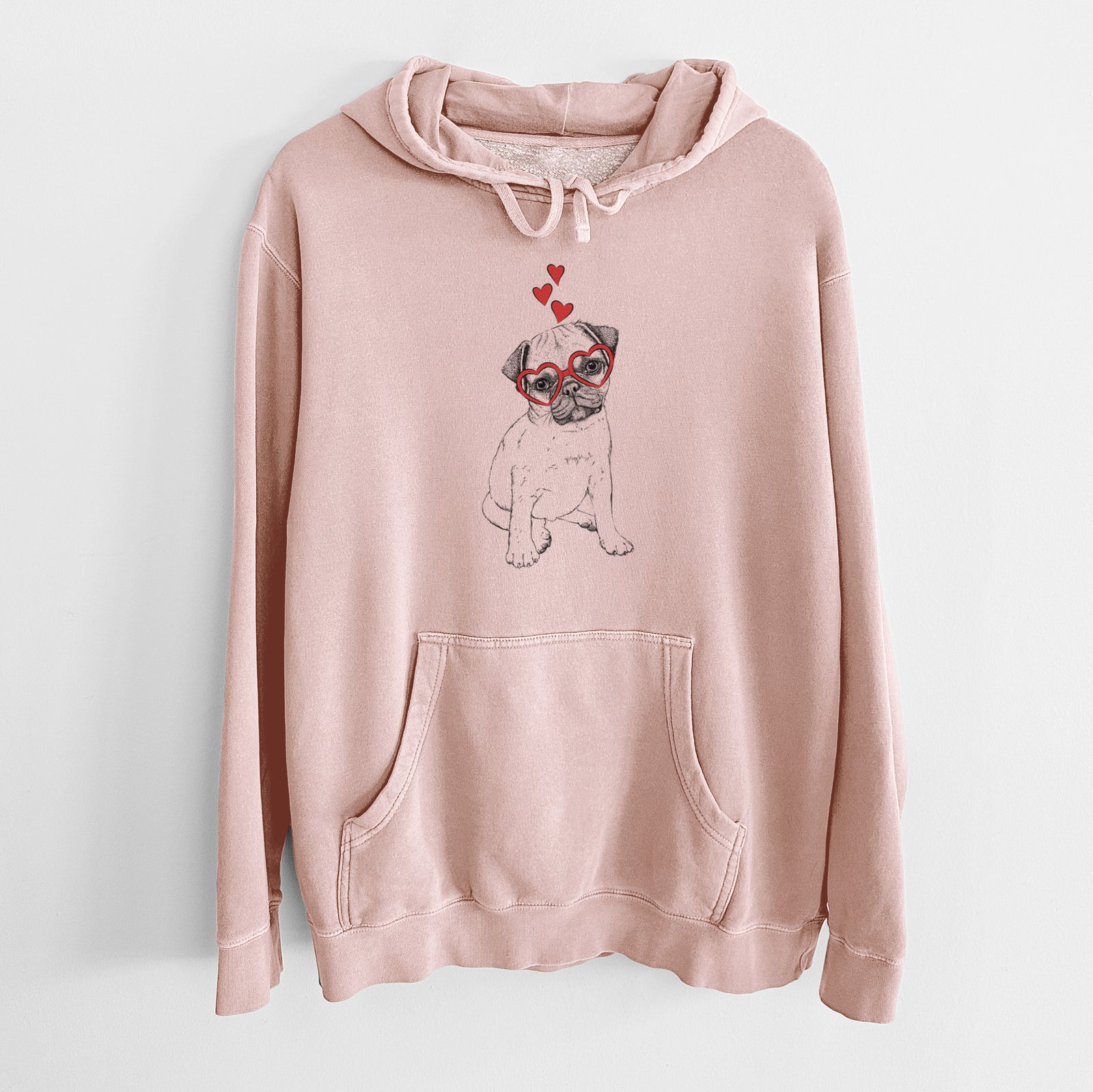 Hand-drawn sketch of Nelson the Pug Puppy wearing heart-shaped glasses on a Dusty Pink Unisex pigment dyed hoodie