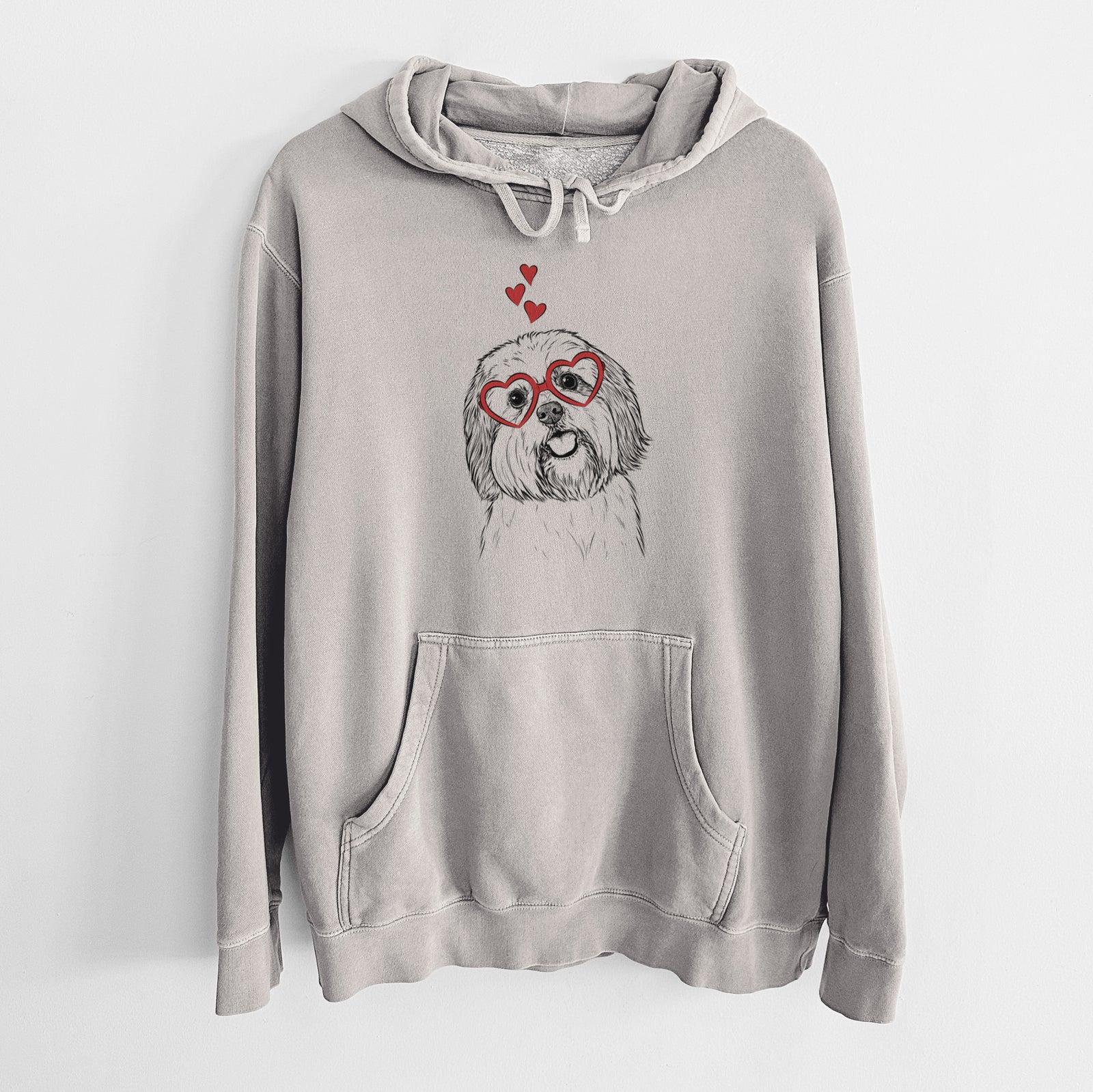 Hand-drawn sketch of Nikka the Lowchen wearing heart-shaped glasses on a Cement Unisex pigment dyed hoodie