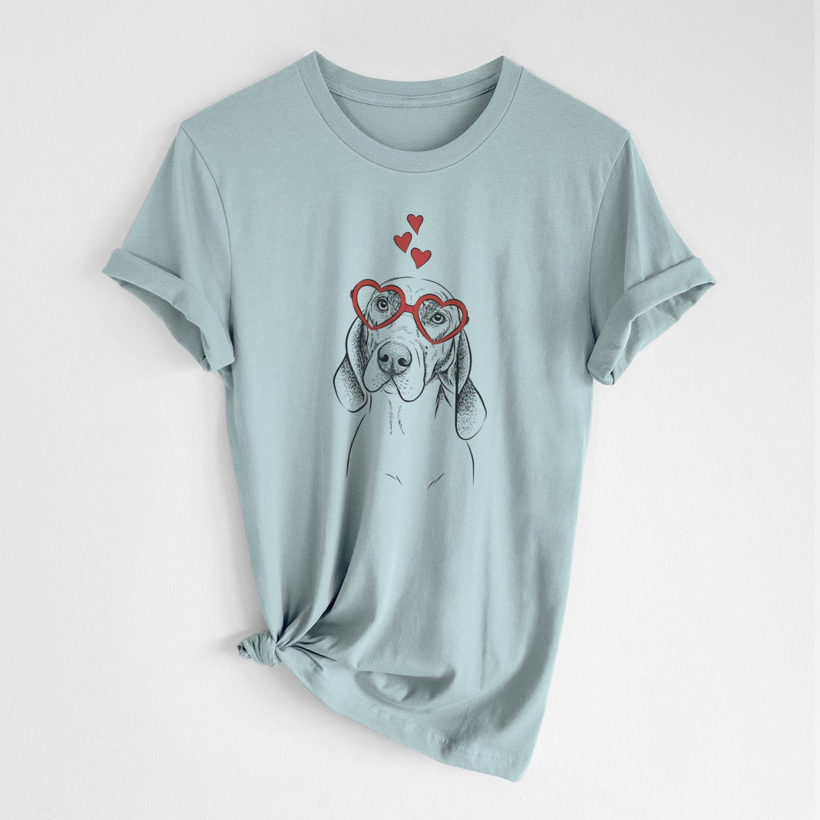 Hand-drawn sketch of Norman the Plott Hound wearing heart-shaped glasses on a Dusty Blue Unisex crewneck, worn by a woman