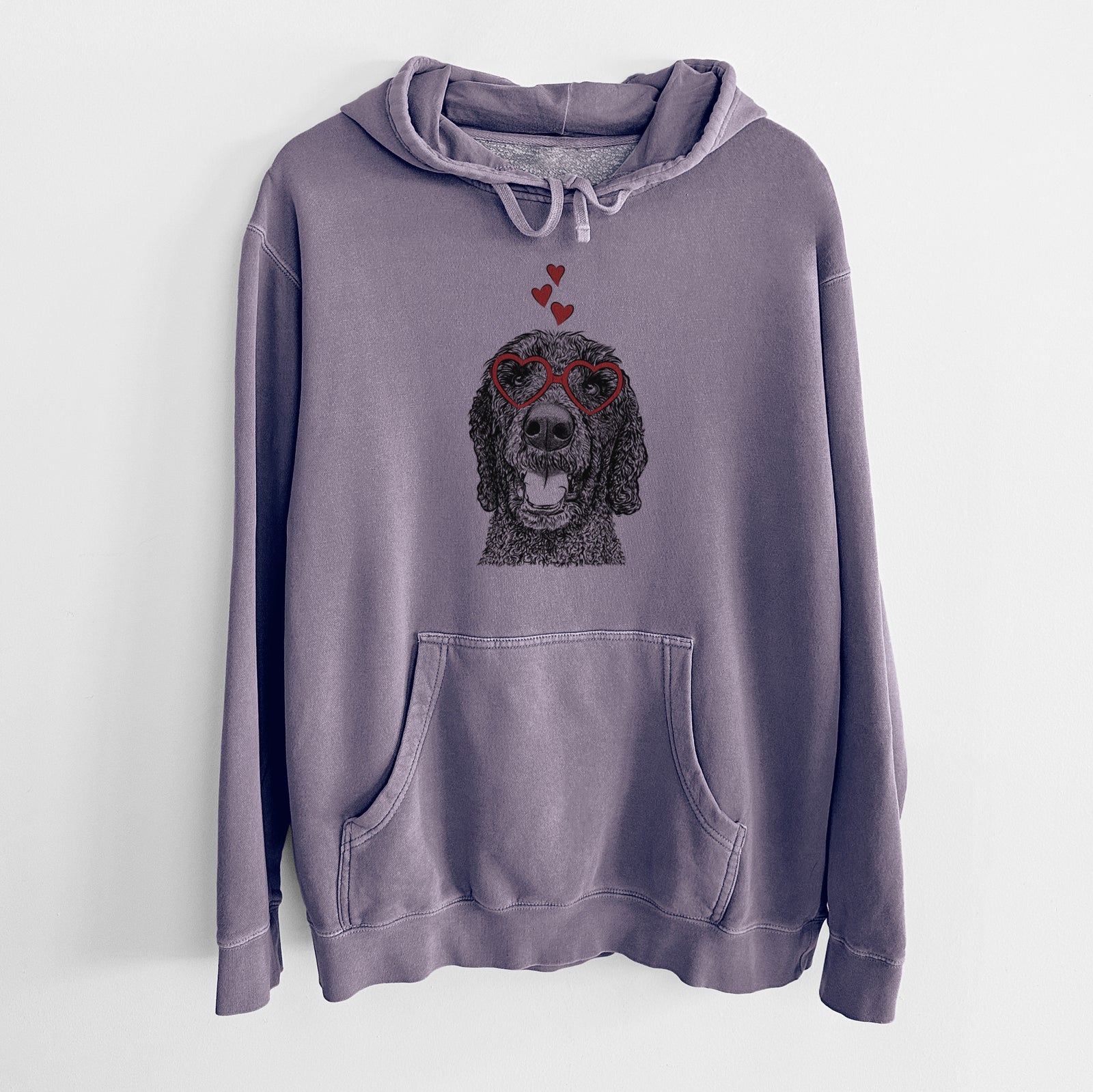 Hand-drawn sketch of Obi James the Goldendoodle wearing heart-shaped glasses on a Plum Unisex pigment dyed hoodie