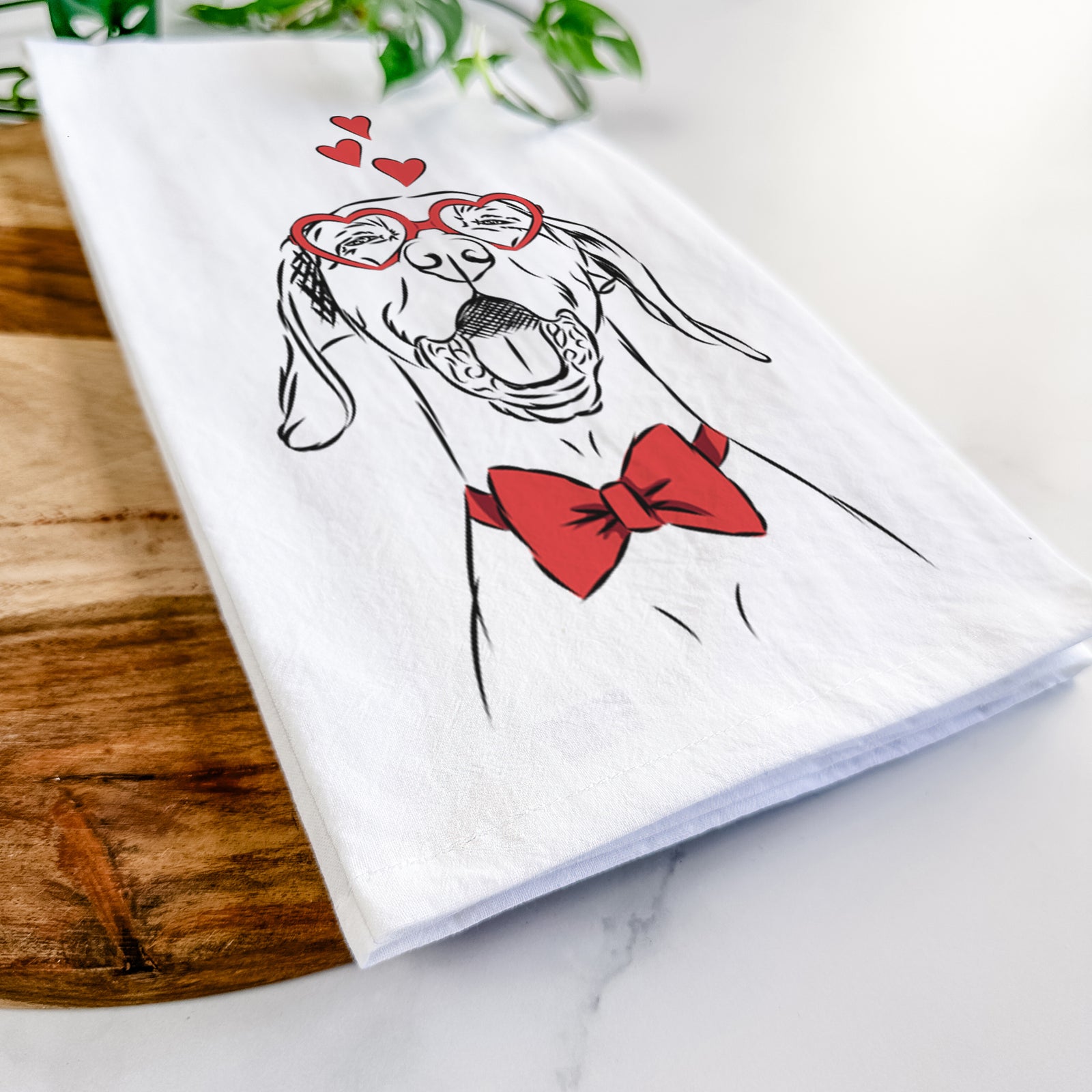 Hand-drawn sketch of Ollie the Vizsla wearing heart-shaped glasses on a tea towel