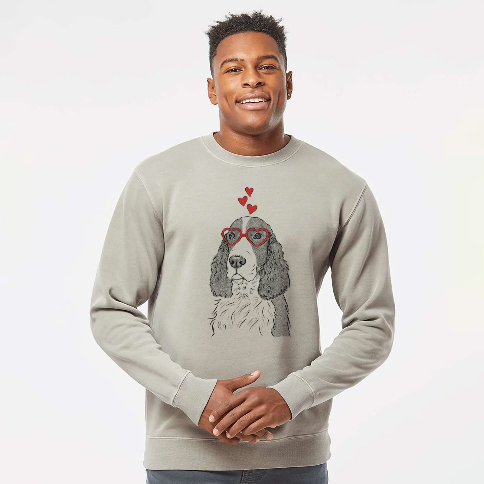 Hand-drawn sketch of Quincy the English Springer Spaniel wearing heart-shaped glasses on a Cement Unisex pigment dyed crew sweatshirt