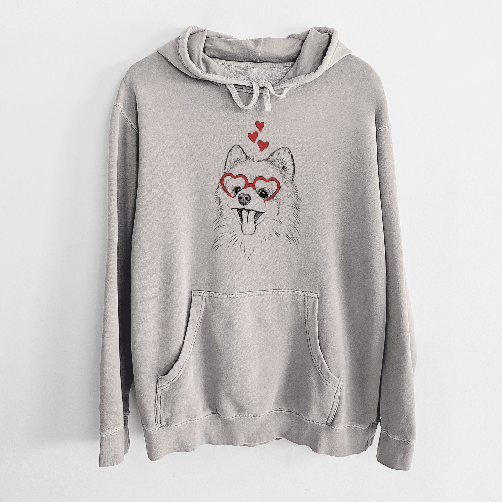 Hand-drawn sketch of Quinn the Pomeranian wearing heart-shaped glasses on a Cement Unisex pigment dyed hoodie