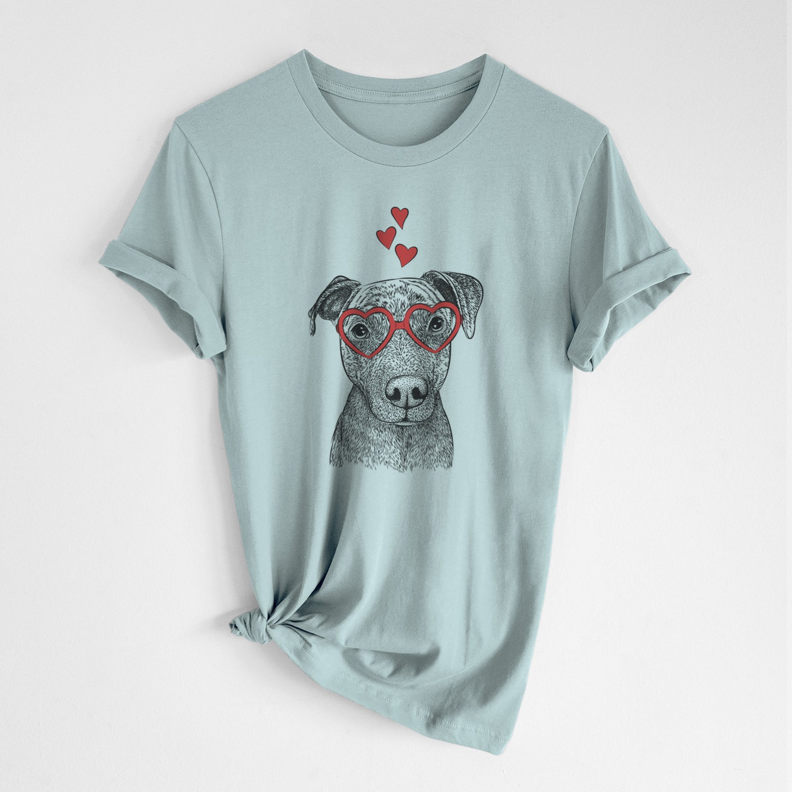 Hand-drawn sketch of Reeses the Pitbull wearing heart-shaped glasses on a Dusty Blue Unisex crewneck, worn by a woman