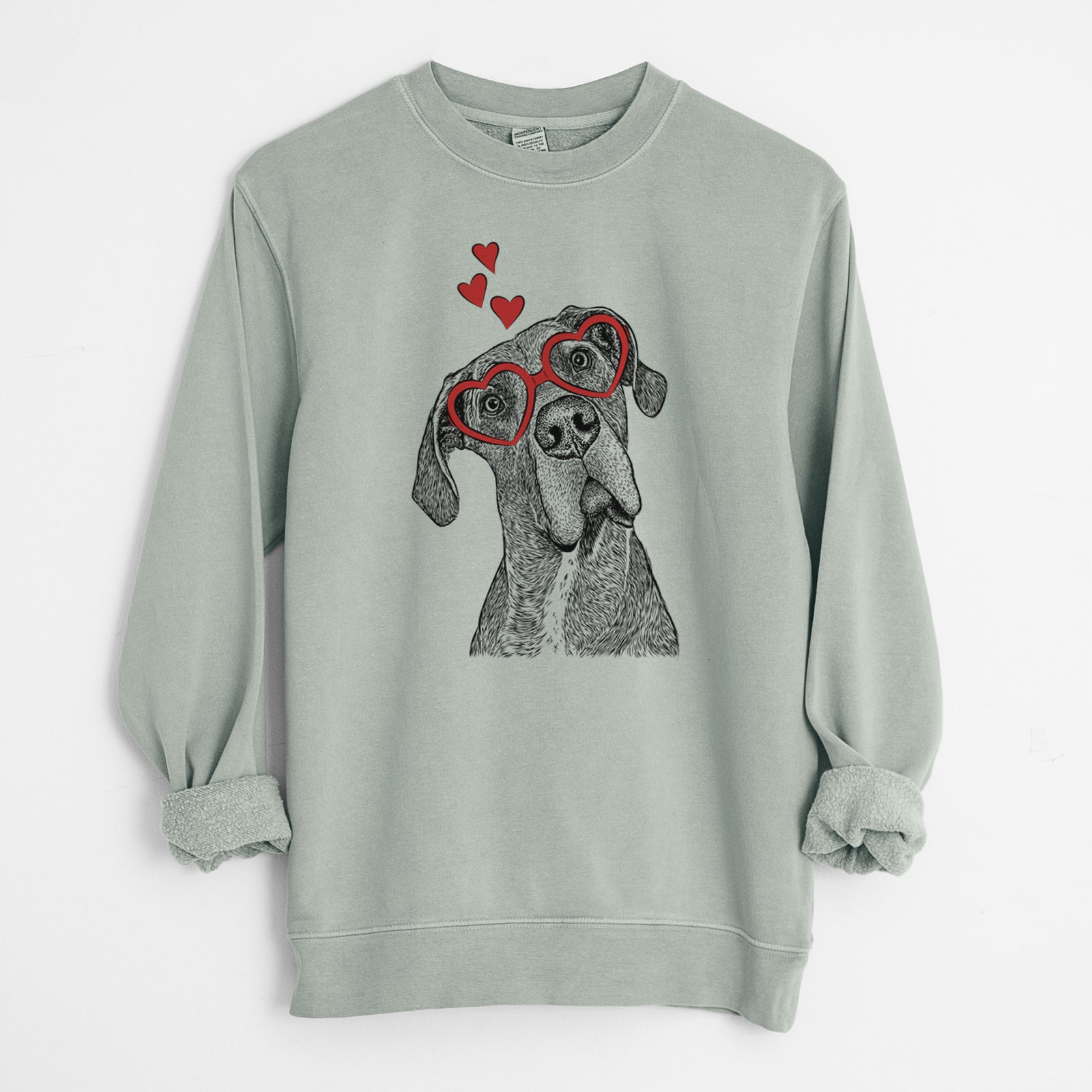 Hand-drawn sketch of River the Great Dane wearing heart-shaped glasses on a Sage Unisex pigment dyed crew sweatshirt