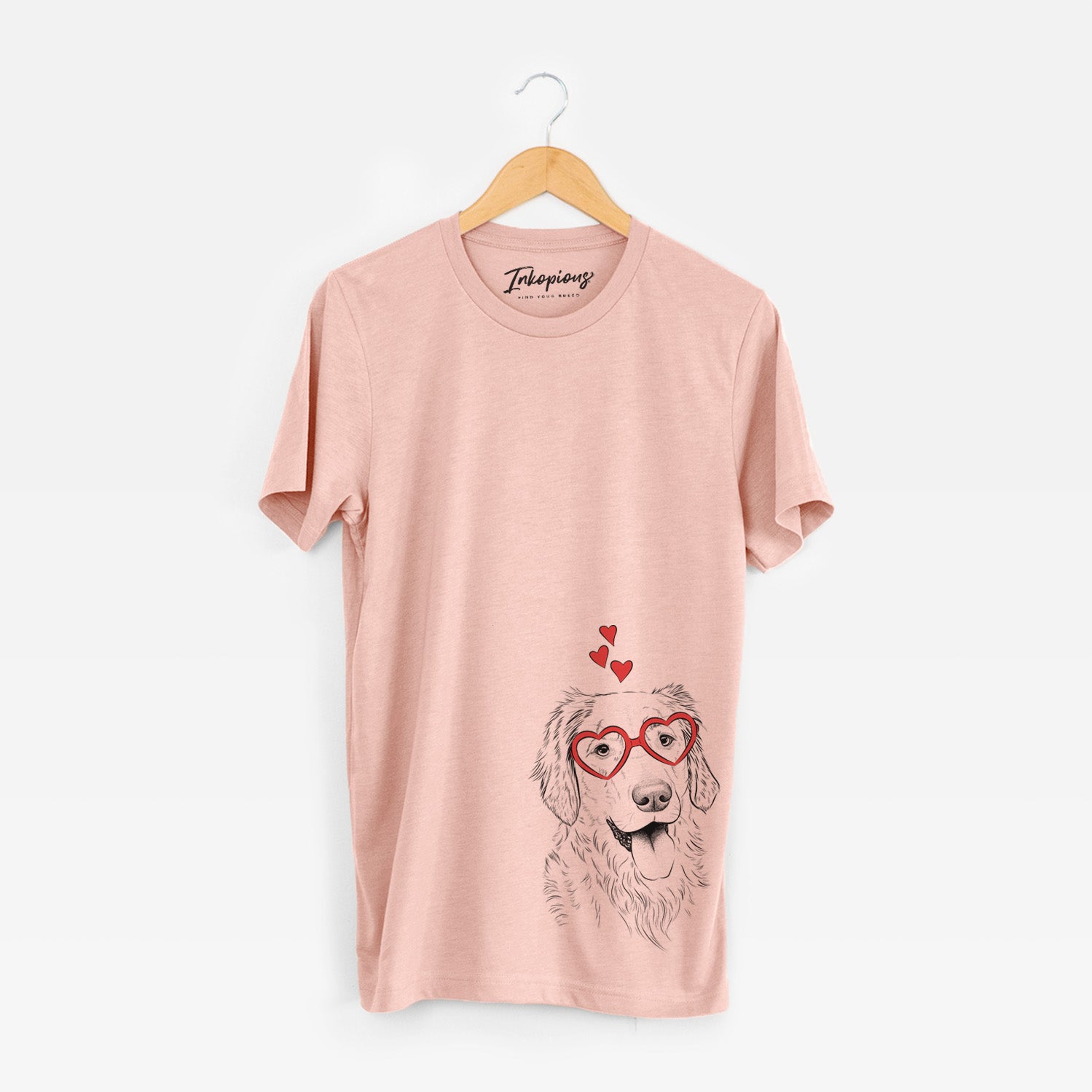 Hand-drawn sketch of Semba the Golden Retriever wearing heart-shaped glasses on a Peach Unisex crewneck