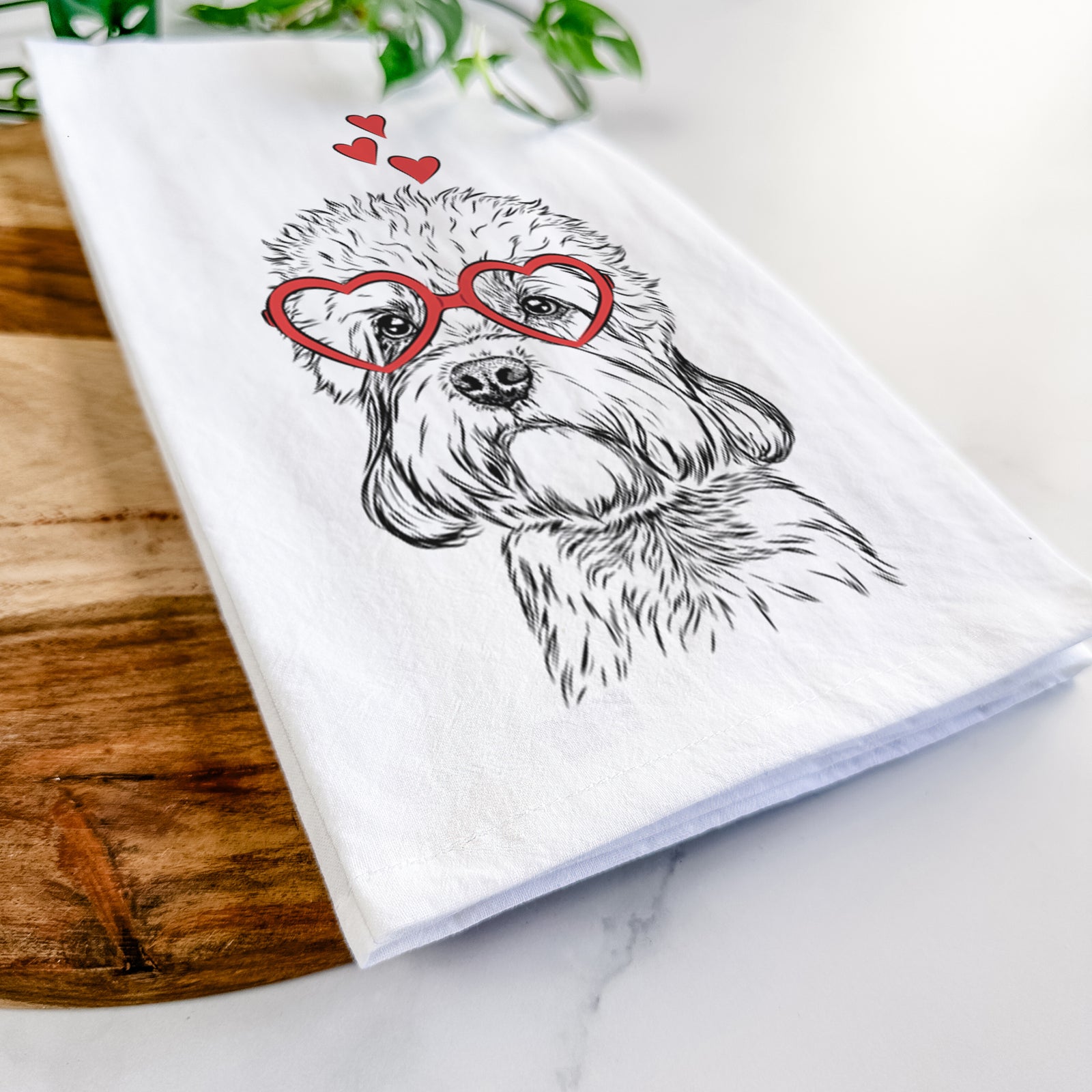Hand-drawn sketch of Sir Walter the Dandie Dinmont Terrier wearing heart-shaped glasses on a tea towel