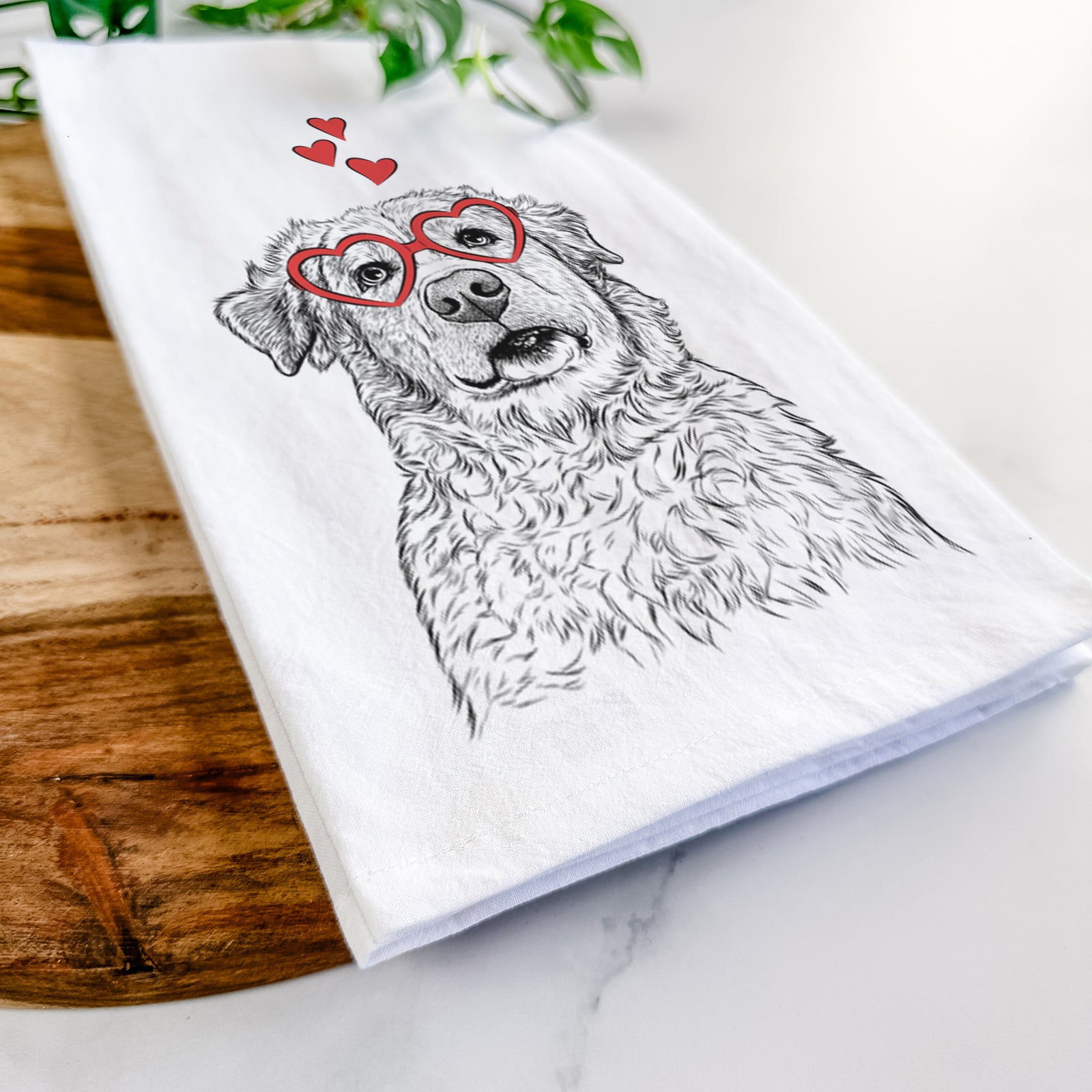 Hand-drawn sketch of Smokey Jam the Middle Eastern Village Dog wearing heart-shaped glasses on a tea towel