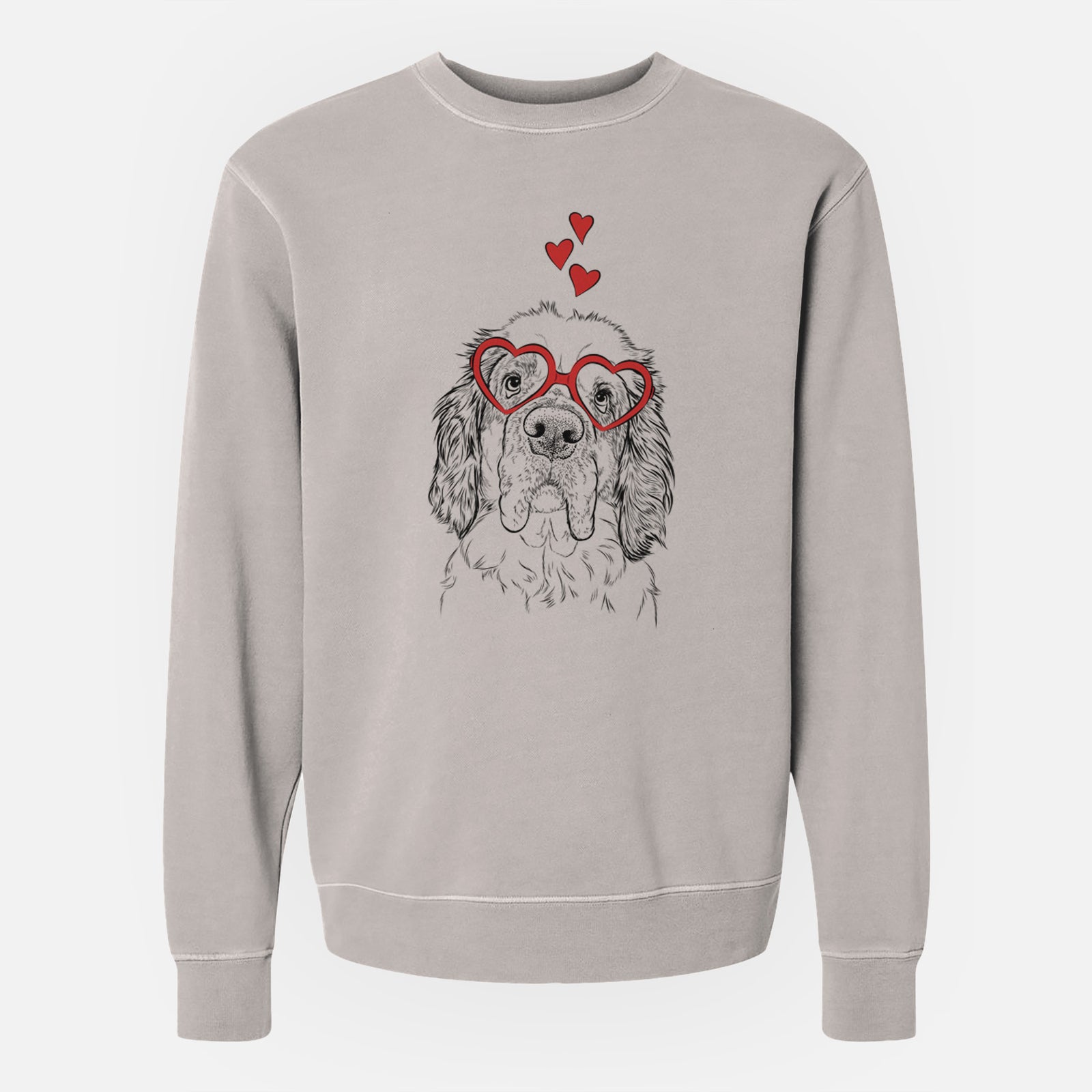 Hand-drawn sketch of Sully the Clumber Spaniel wearing heart-shaped glasses on a Cement Unisex pigment dyed crew sweatshirt