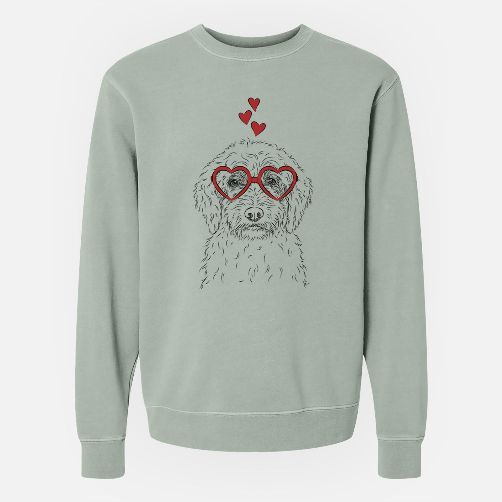 Hand-drawn sketch of Teddy the Labradoodle wearing heart-shaped glasses on a Sage Unisex pigment dyed crew sweatshirt