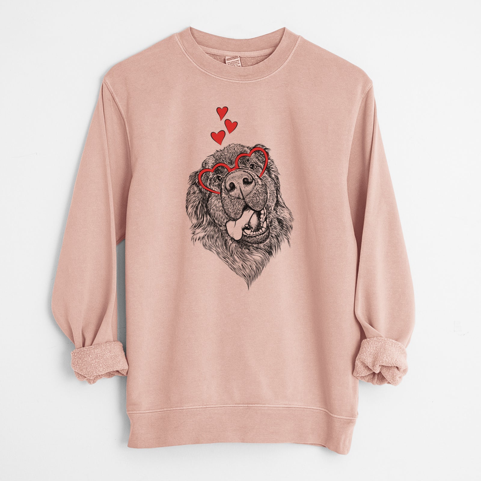 Hand-drawn sketch of Tuna the Newfoundland wearing heart-shaped glasses on a Dusty Pink Unisex pigment dyed crew sweatshirt