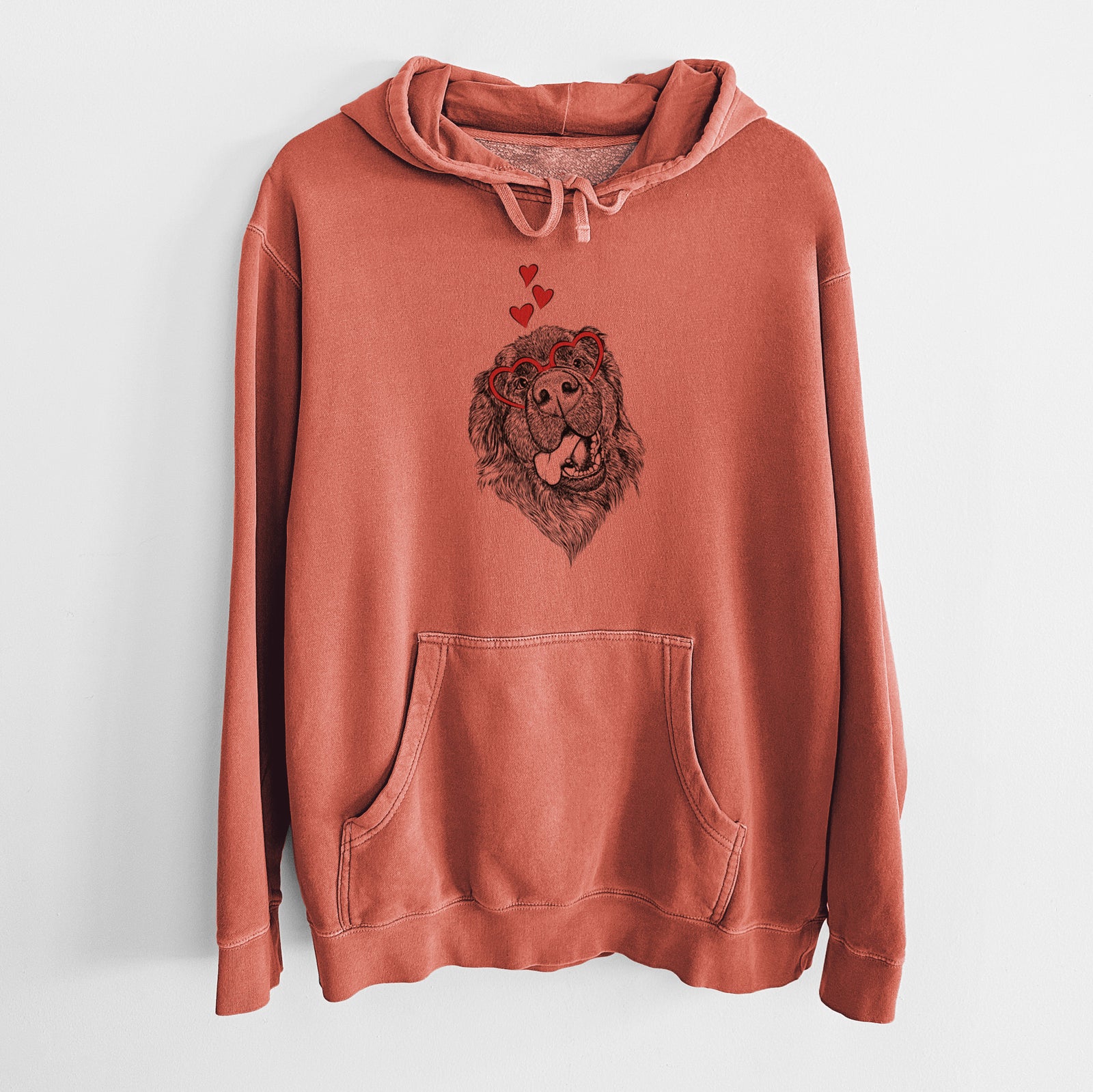 Hand-drawn sketch of Tuna the Newfoundland wearing heart-shaped glasses on an Amber Unisex pigment dyed hoodie