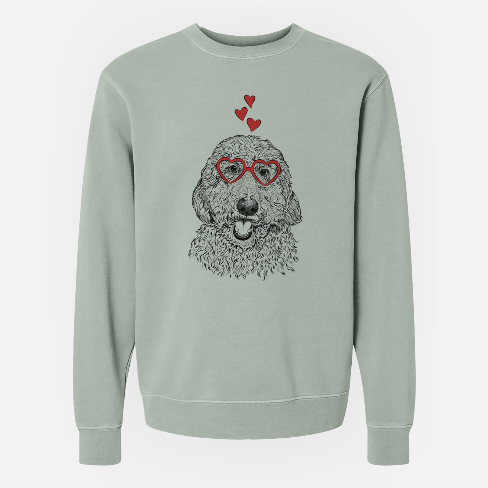 Hand-drawn sketch of Whisper the Goldendoodle wearing heart-shaped glasses on a Sage Unisex pigment dyed crew sweatshirt
