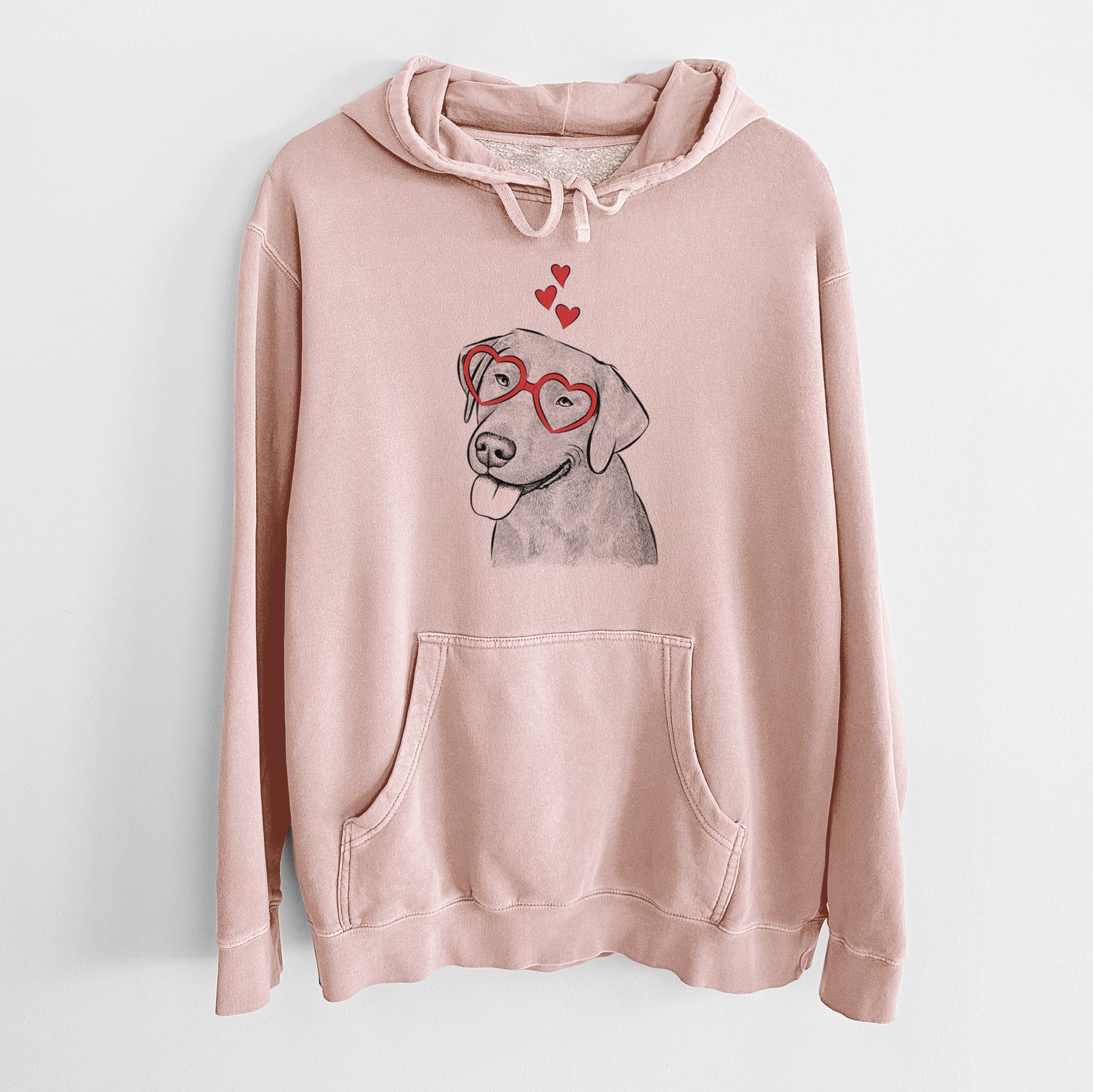 Hand-drawn sketch of Zeppelin the Black Labrador wearing heart-shaped glasses on a Dusty Pink Unisex pigment dyed hoodie