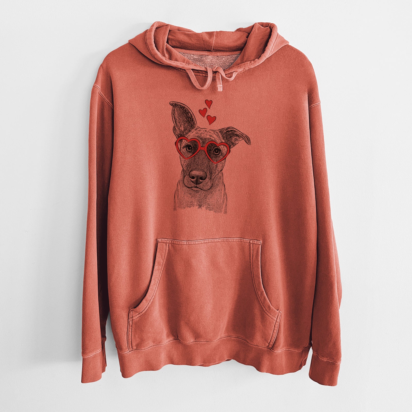 Hand-drawn sketch of Zoey the Mixed Breed wearing heart-shaped glasses on an Amber Unisex pigment dyed hoodie