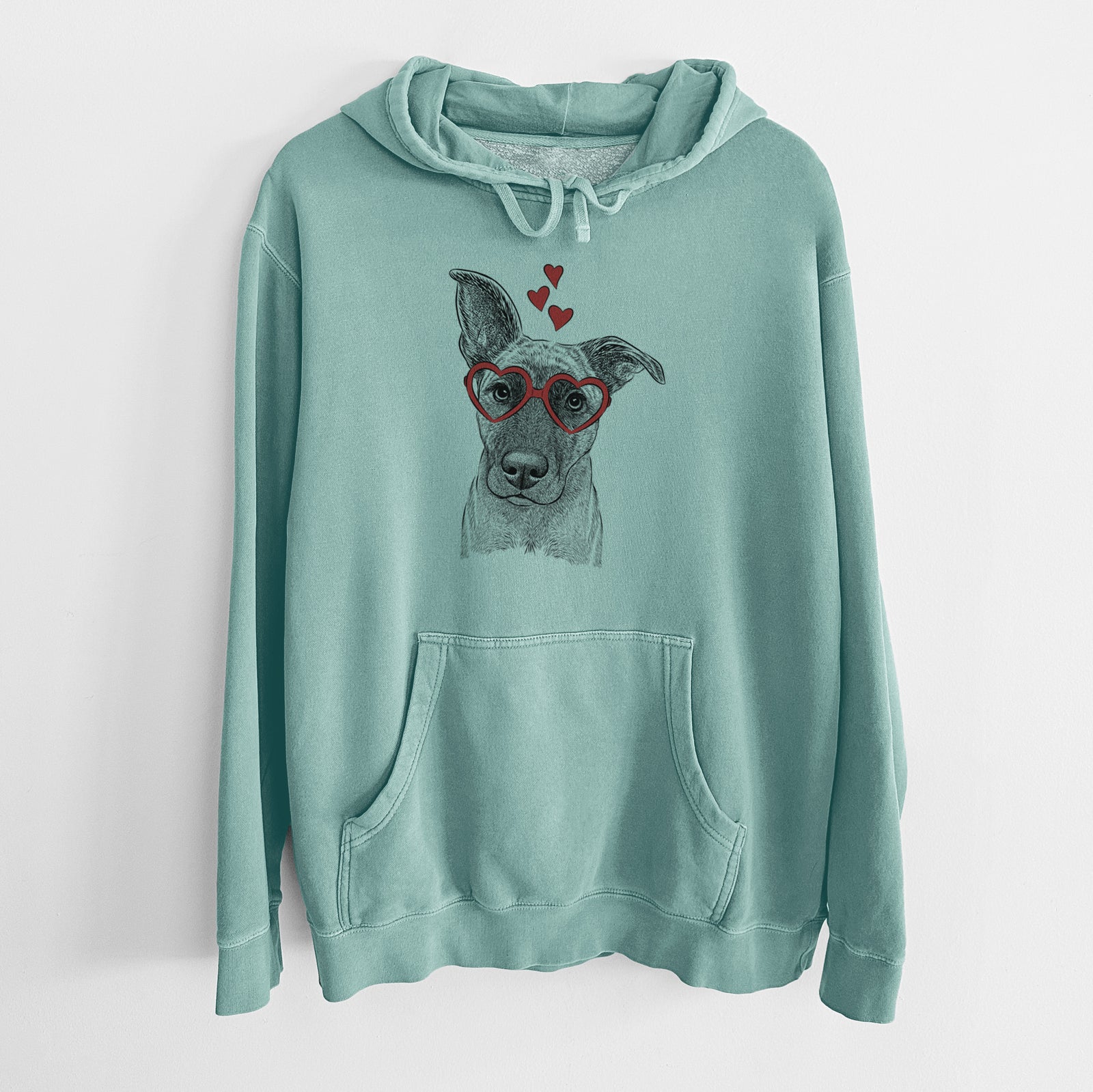 Hand-drawn sketch of Zoey the Mixed Breed wearing heart-shaped glasses on a Mint Unisex pigment dyed hoodie