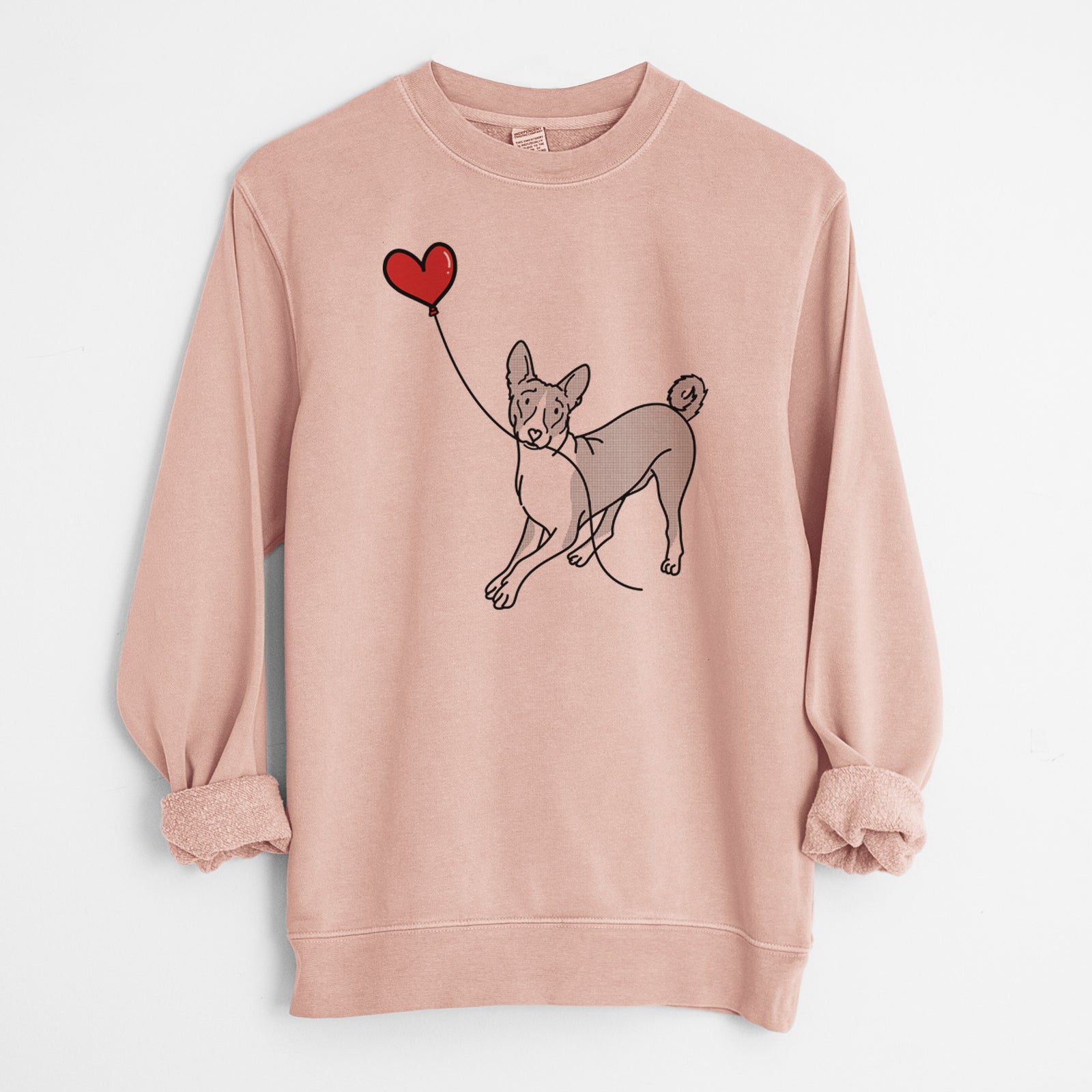 Minimalist line drawing of a Basenji Heart String holding a heart balloon on a Dusty Pink Unisex pigment dyed crew sweatshirt