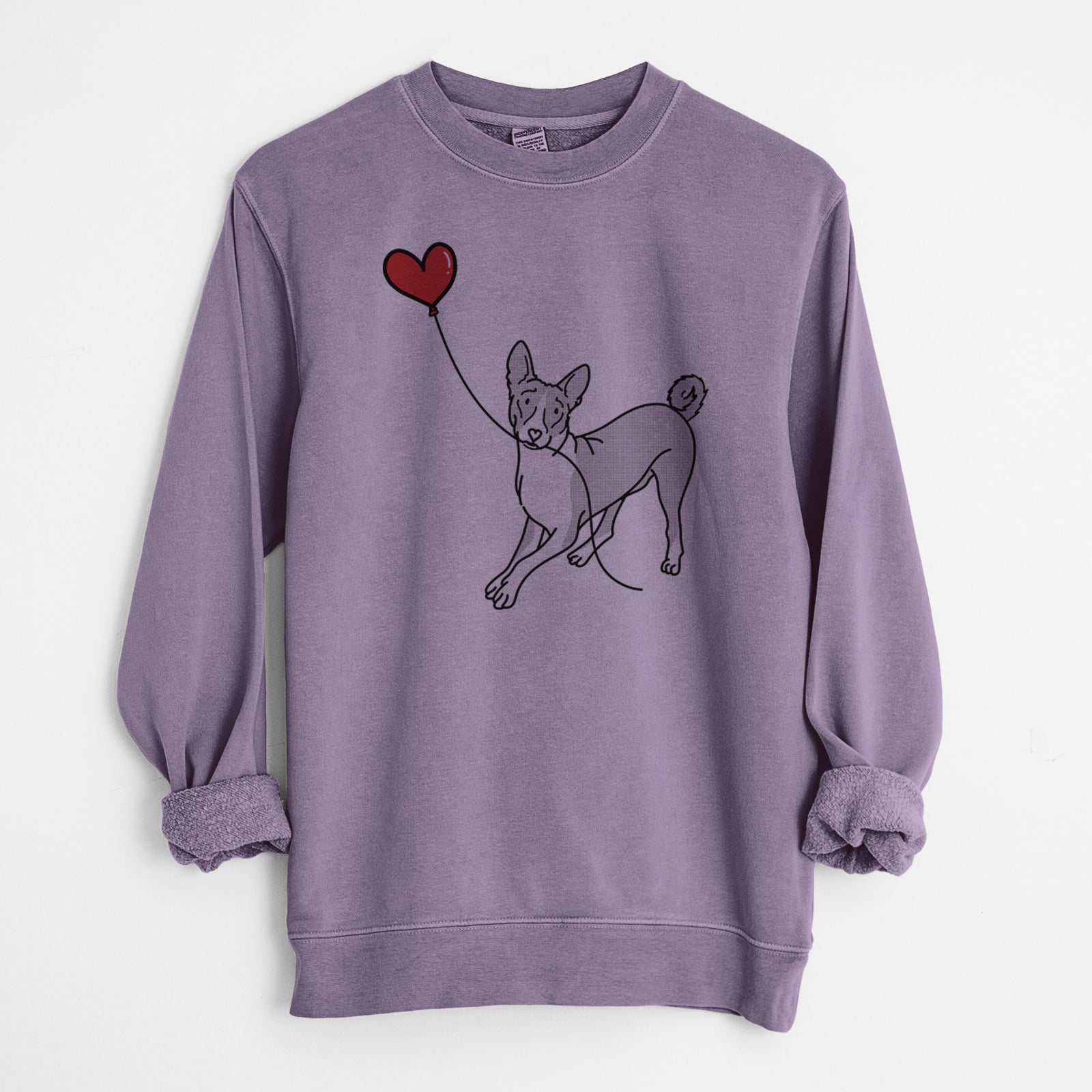 Minimalist line drawing of a Basenji Heart String holding a heart balloon on a Plum Unisex pigment dyed crew sweatshirt
