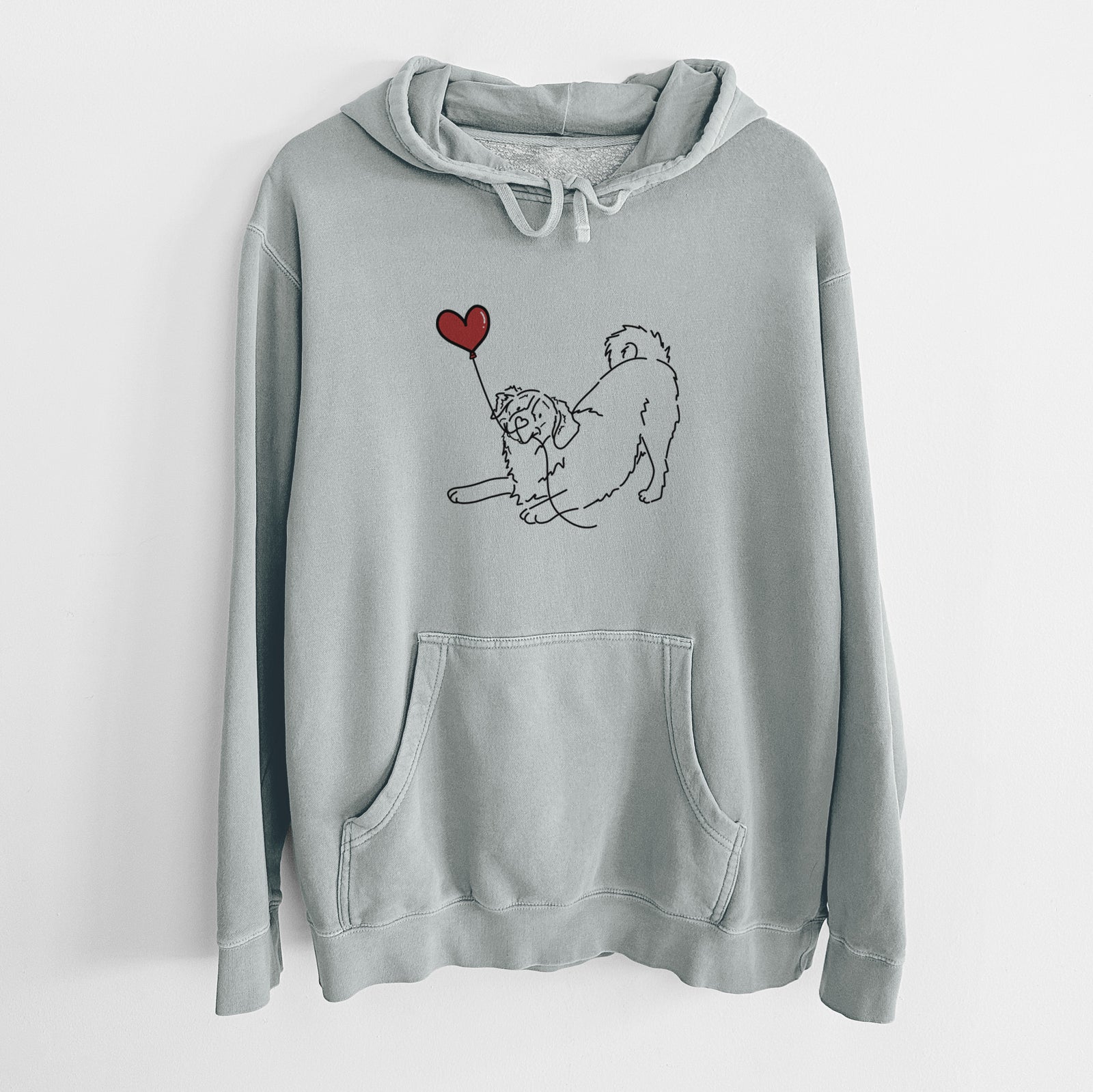 Minimalist line drawing of a Bernese Mountain Dog Heart String holding a heart balloon on a Sage Unisex pigment dyed hoodie