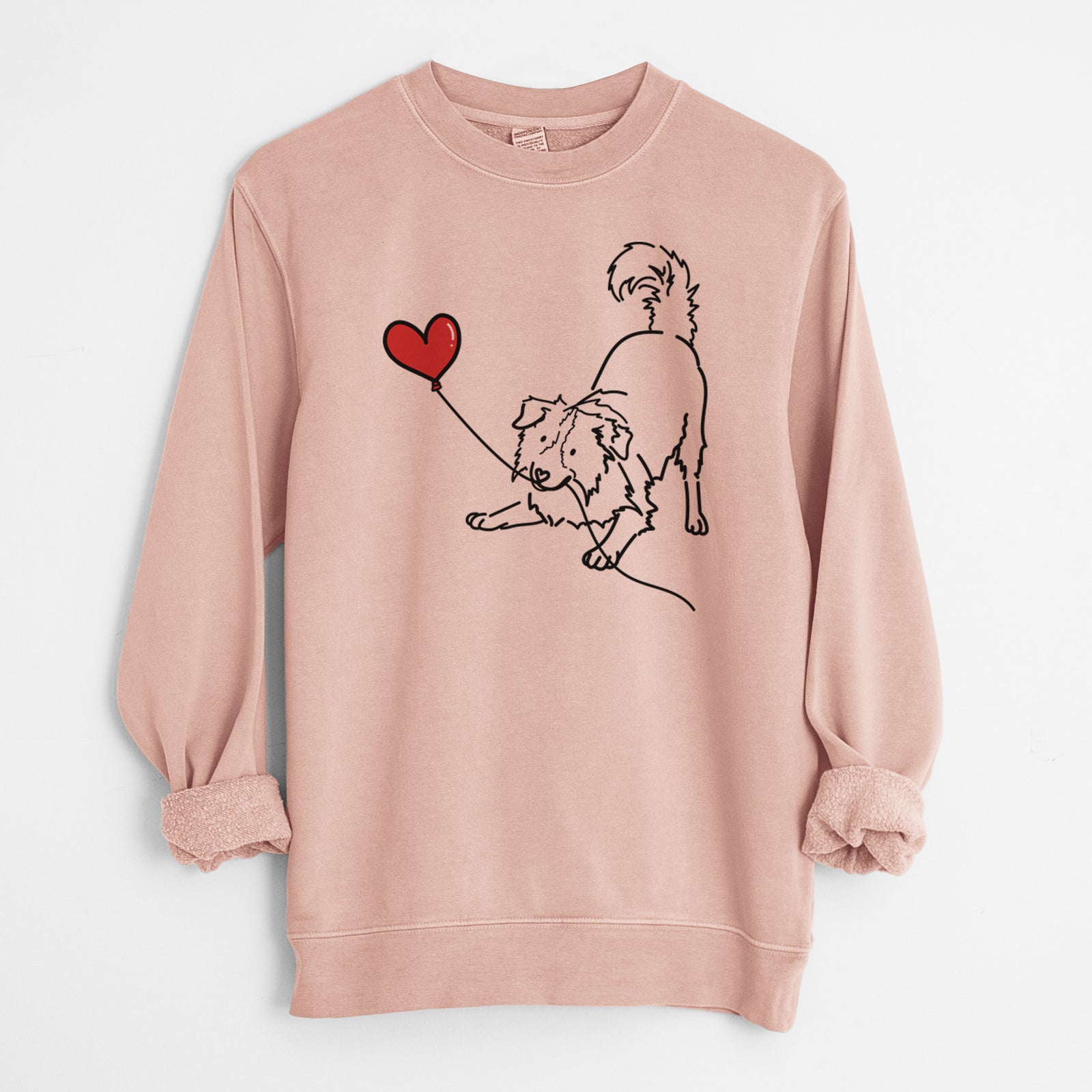Minimalist line drawing of a Border Collie Heart String holding a heart balloon on a Dusty Pink Unisex pigment dyed crew sweatshirt