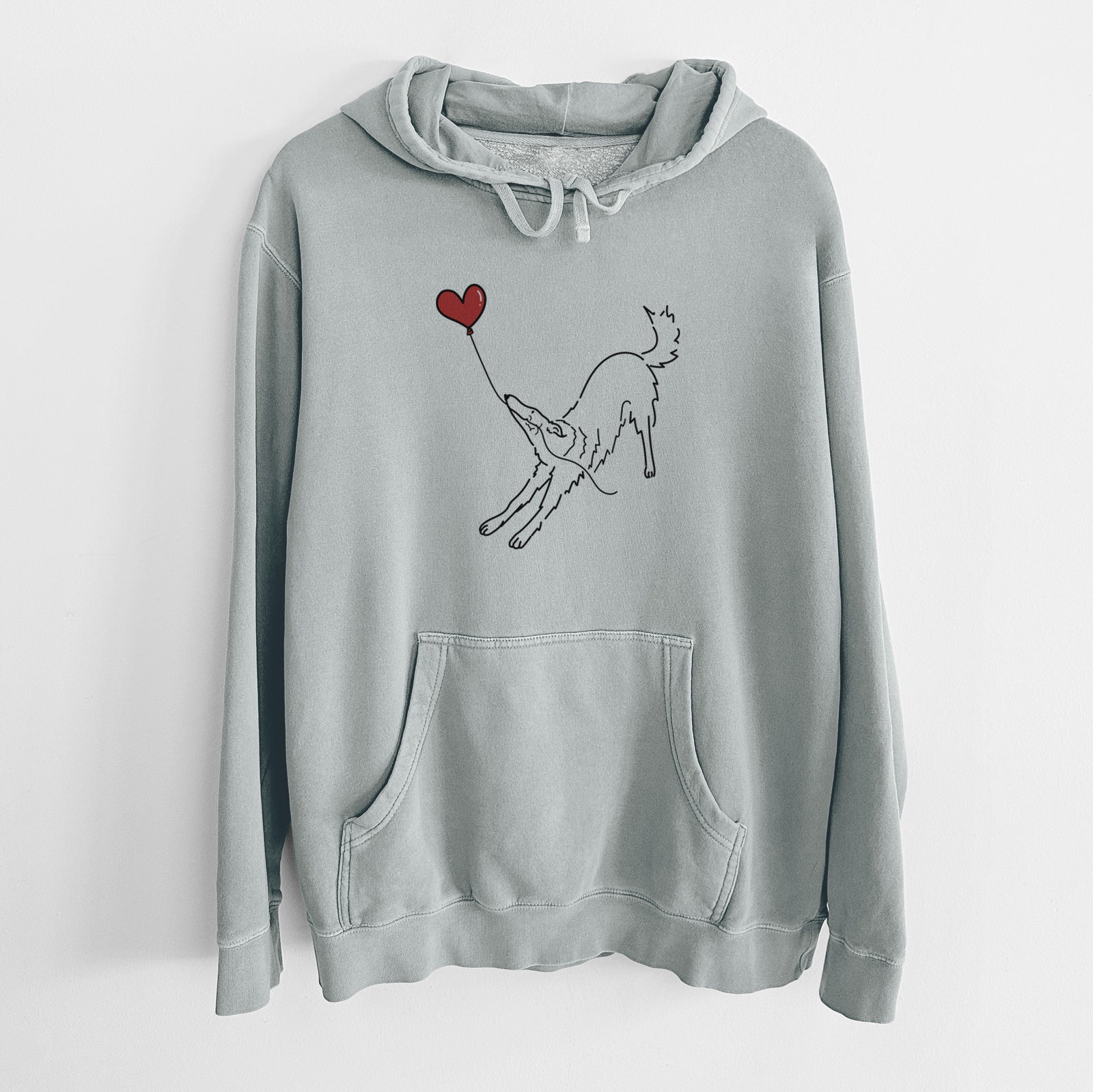 Minimalist line drawing of a Borzoi Heart String holding a heart balloon on a Sage Unisex pigment dyed hoodie