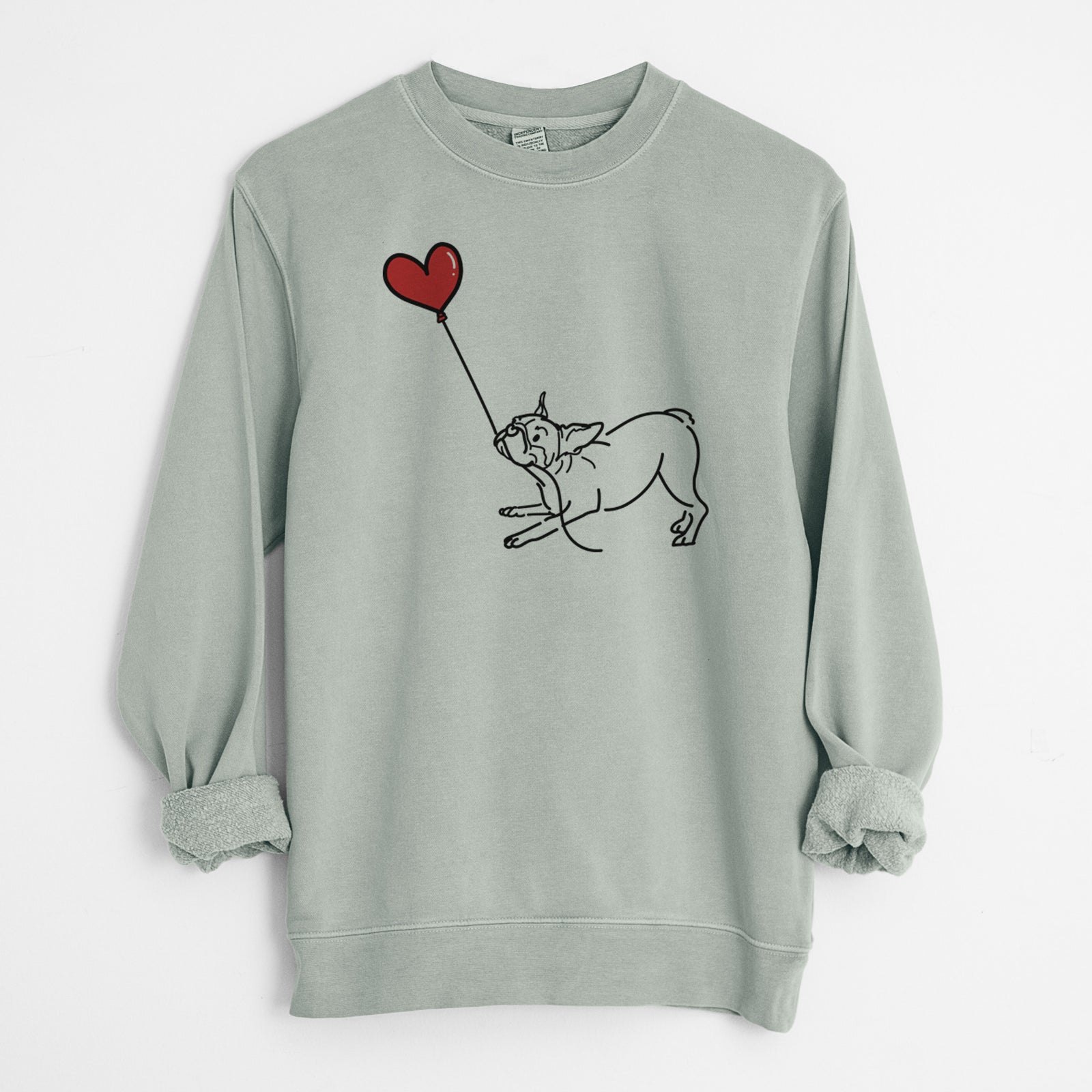 Minimalist line drawing of a Boston Terrier Heart String holding a heart balloon on a Sage Unisex pigment dyed crew sweatshirt