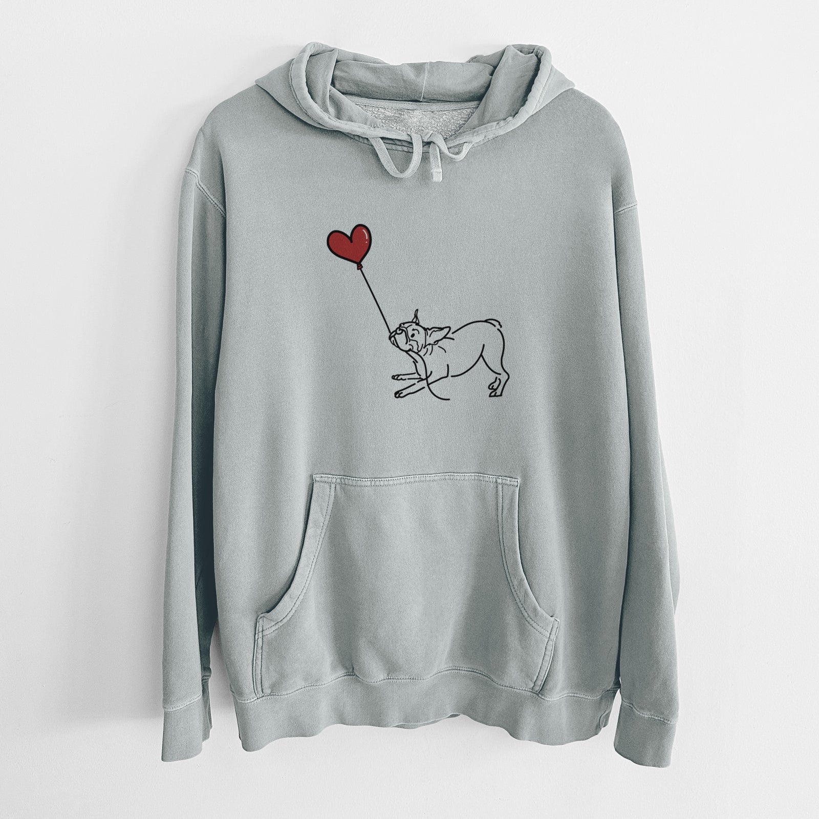 Minimalist line drawing of a Boston Terrier Heart String holding a heart balloon on a Sage Unisex pigment dyed hoodie