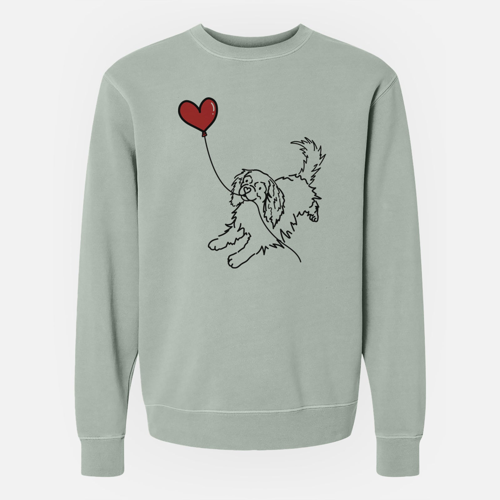 Minimalist line drawing of a Cavalier King Charles Heart String holding a heart balloon on a Sage Unisex pigment dyed crew sweatshirt