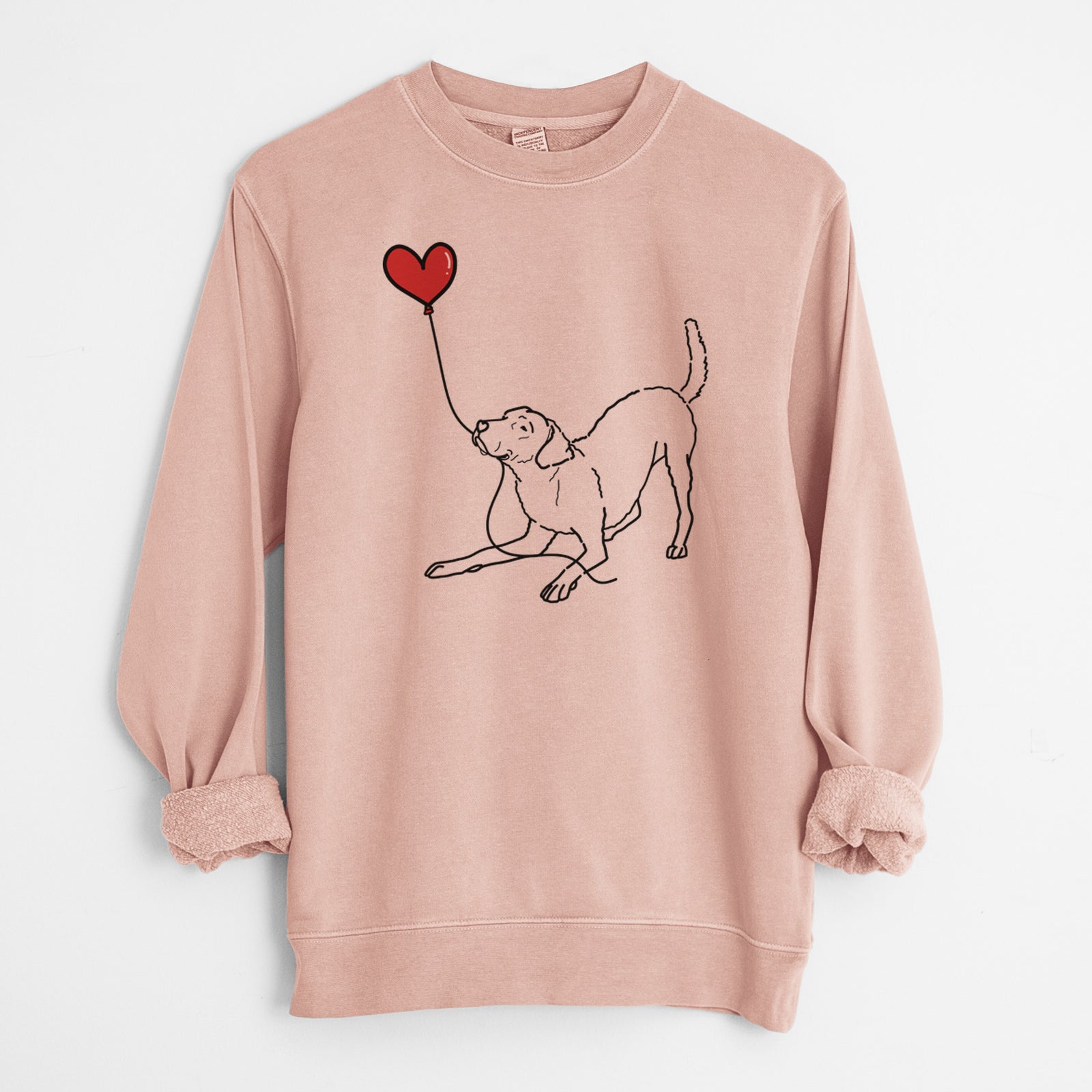 Minimalist line drawing of a Chesapeake Bay Retriever Heart String holding a heart balloon on a Dusty Pink Unisex pigment dyed crew sweatshirt