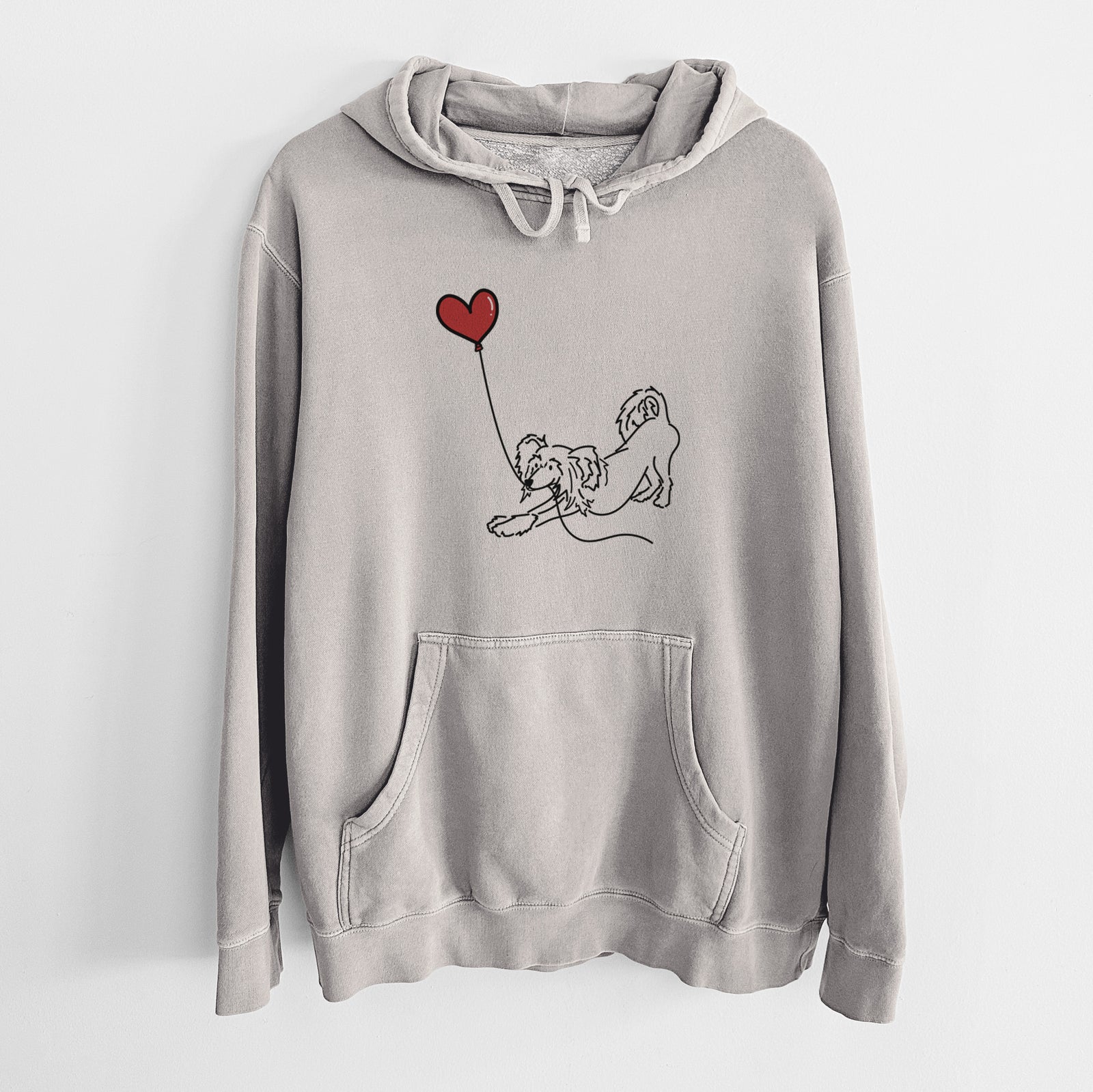 Minimalist line drawing of a Chinese Crested Heart String holding a heart balloon on a Cement Unisex pigment dyed hoodie