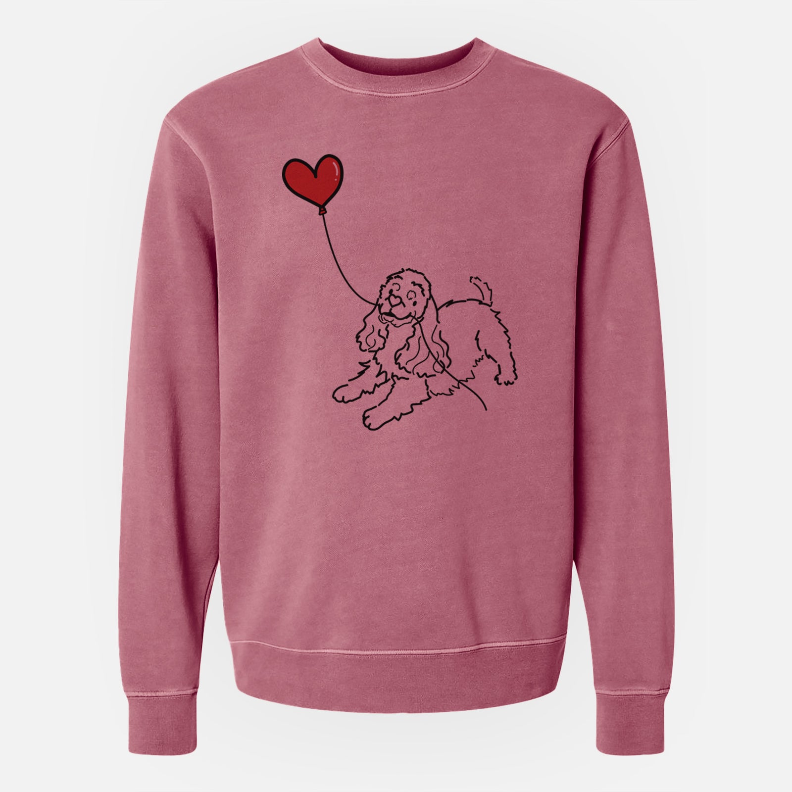 Minimalist line drawing of a Cocker Spaniel Heart String holding a heart balloon on a Maroon Unisex pigment dyed crew sweatshirt