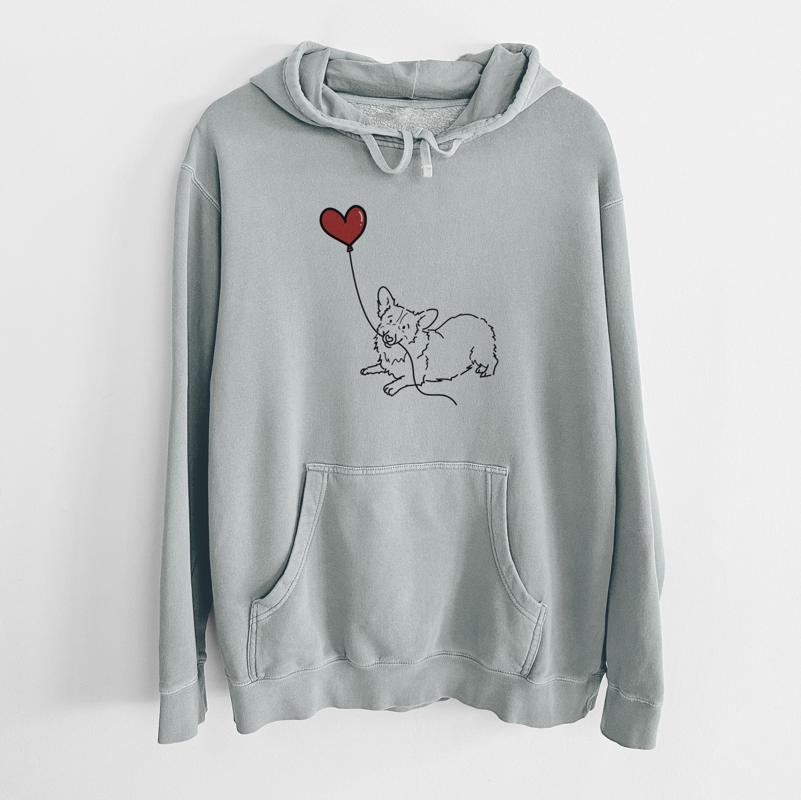 Minimalist line drawing of a Corgi Heart String holding a heart balloon on a Sage Unisex pigment dyed hoodie